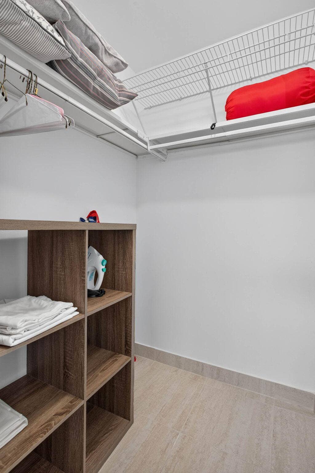 Large walk in closet in guest bedroom