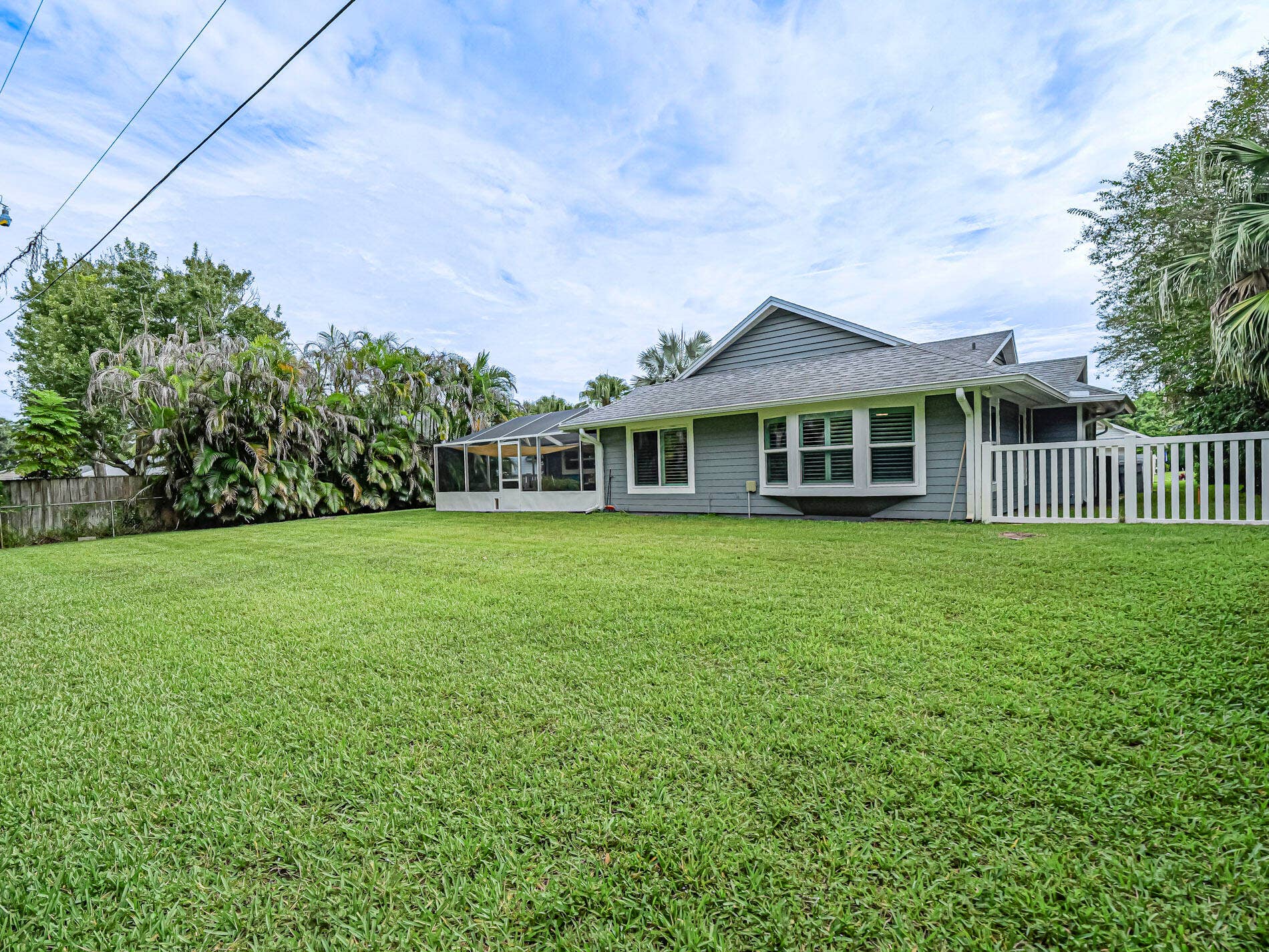 215 8TH Terrace, Vero Beach, FL 32962 Oversized backyard offers plenty of room for activities.