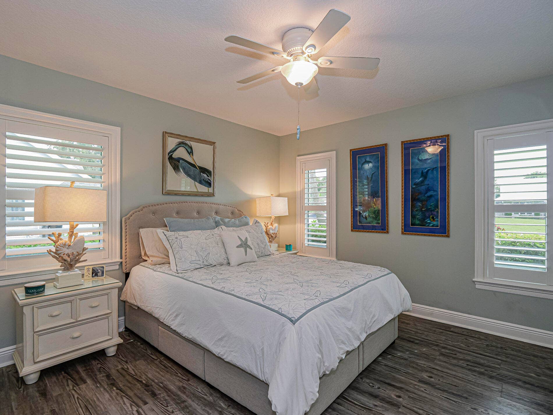215 8TH Terrace, Vero Beach, FL 32962 Second bedroom, enjoys privacy and light. Plantation shutters and wood like vinyl floors.