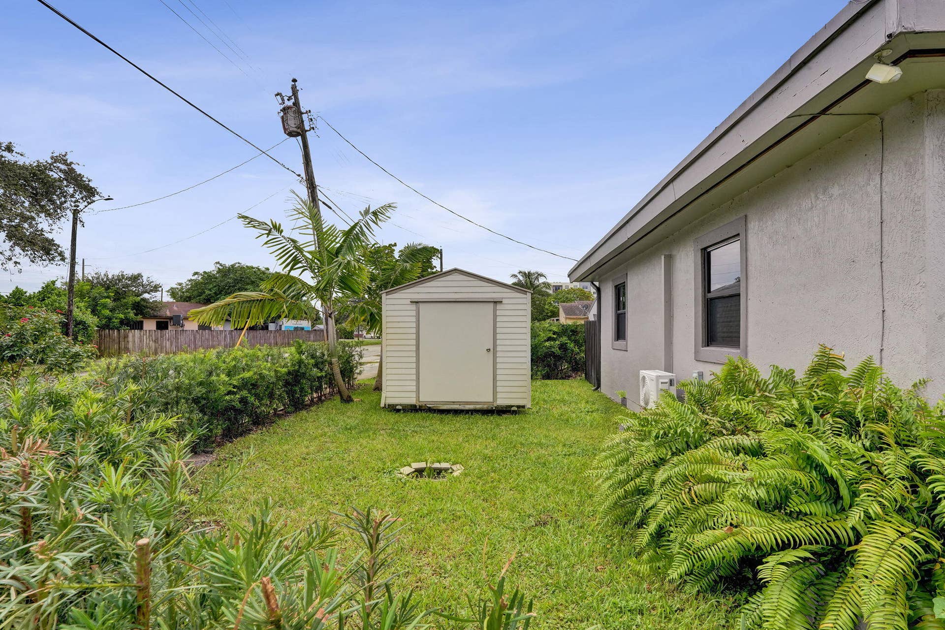 side yard with 2nds storage shed