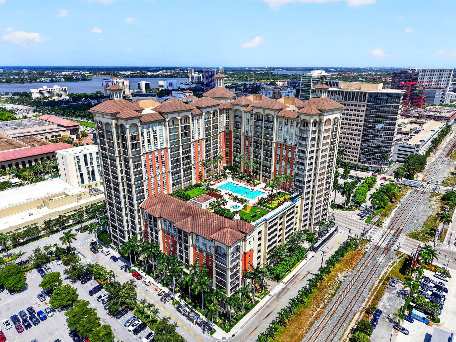 550 OKEECHOBEE Boulevard, #1618, West Palm Beach, West Palm Beach, FL 33401 Luxury mid-rise residential tower featuring copper-accented rooflines and warm brick and stone faade