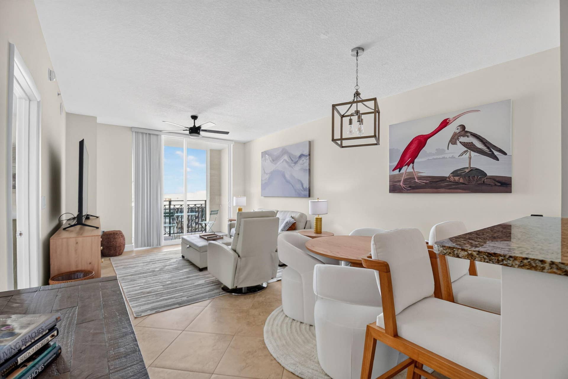 550 OKEECHOBEE Boulevard, #1618, West Palm Beach, West Palm Beach, FL 33401 Open-concept living space with tile flooring, a ceiling fan, and access to a balcony
