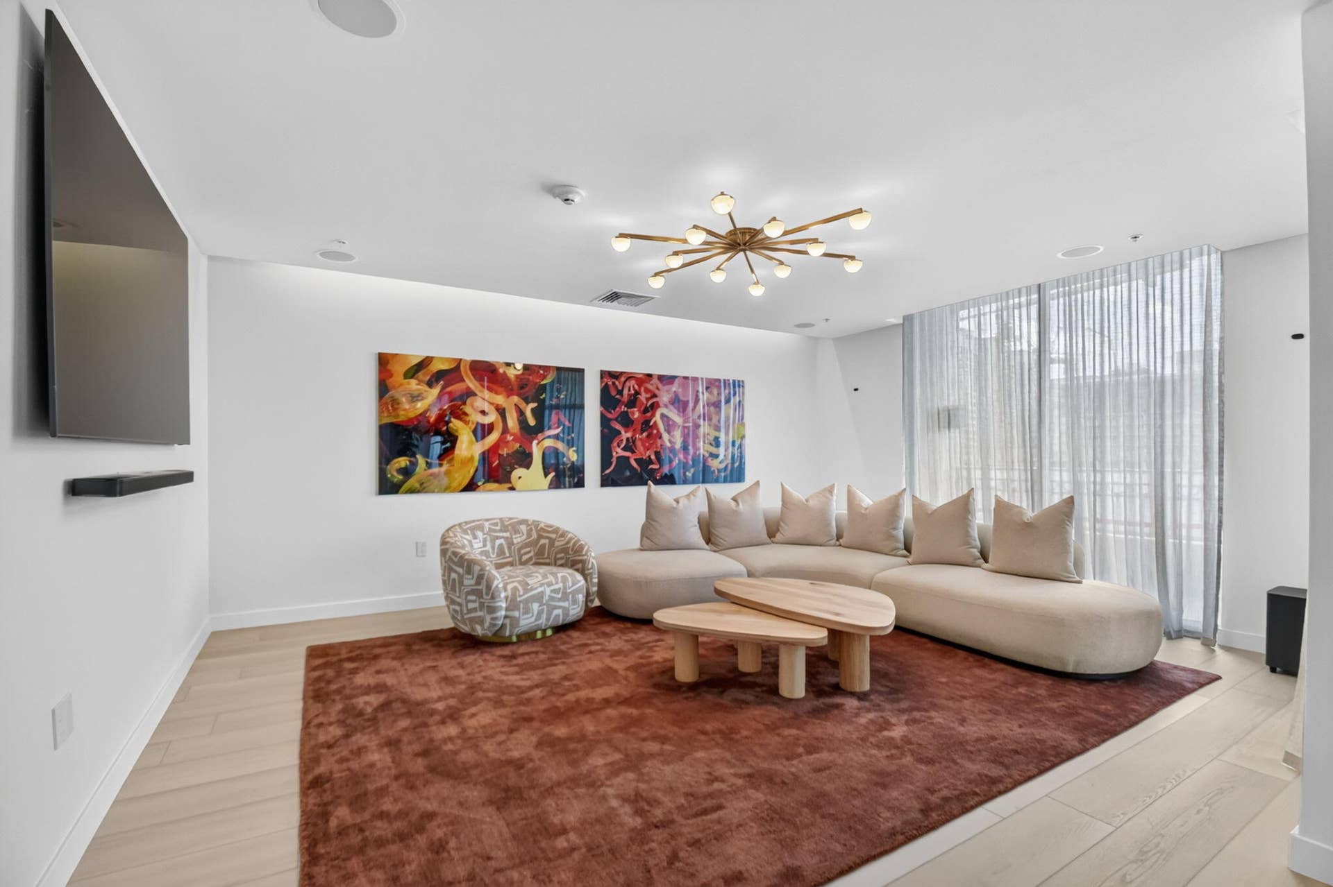 550 OKEECHOBEE Boulevard, #1618, West Palm Beach, West Palm Beach, FL 33401 Recessed ceiling lighting, wood-finish flooring, full-height windows, and a Sputnik-style chandelier