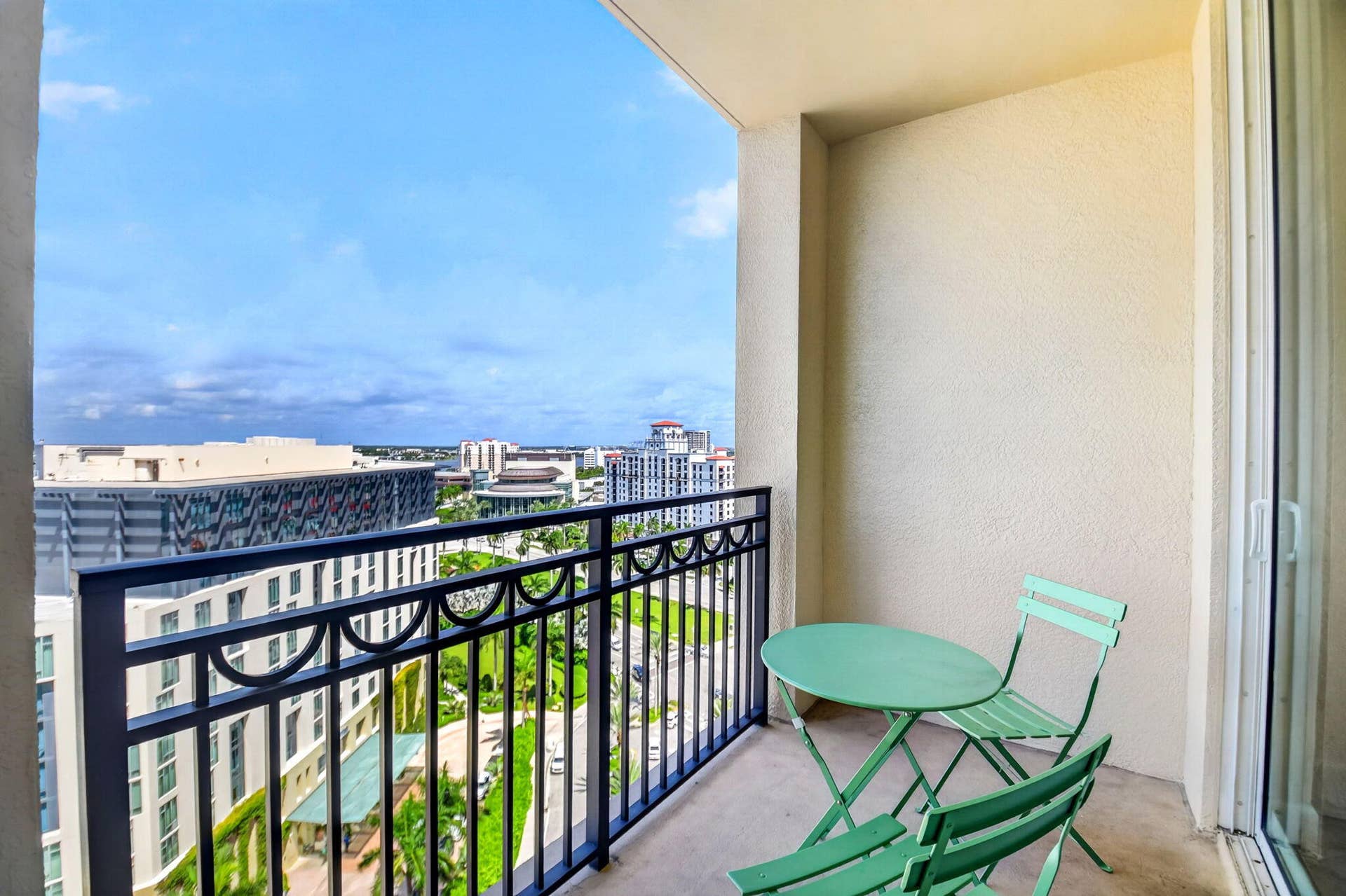 550 OKEECHOBEE Boulevard, #1618, West Palm Beach, West Palm Beach, FL 33401 Private balcony with black wrought iron railing, concrete flooring, and sliding glass door access