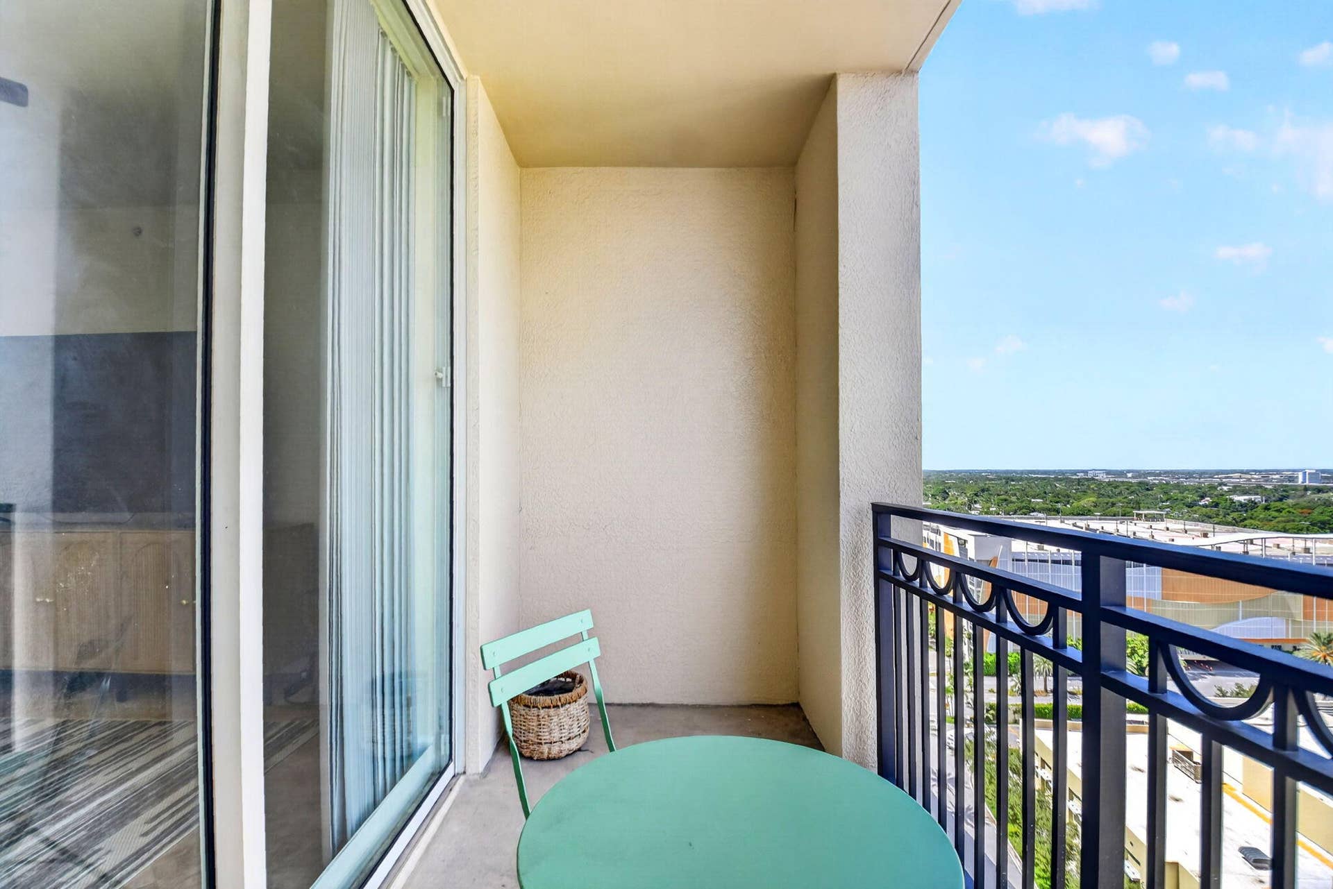 550 OKEECHOBEE Boulevard, #1618, West Palm Beach, West Palm Beach, FL 33401 Private balcony featuring a decorative metal railing and a sliding glass door