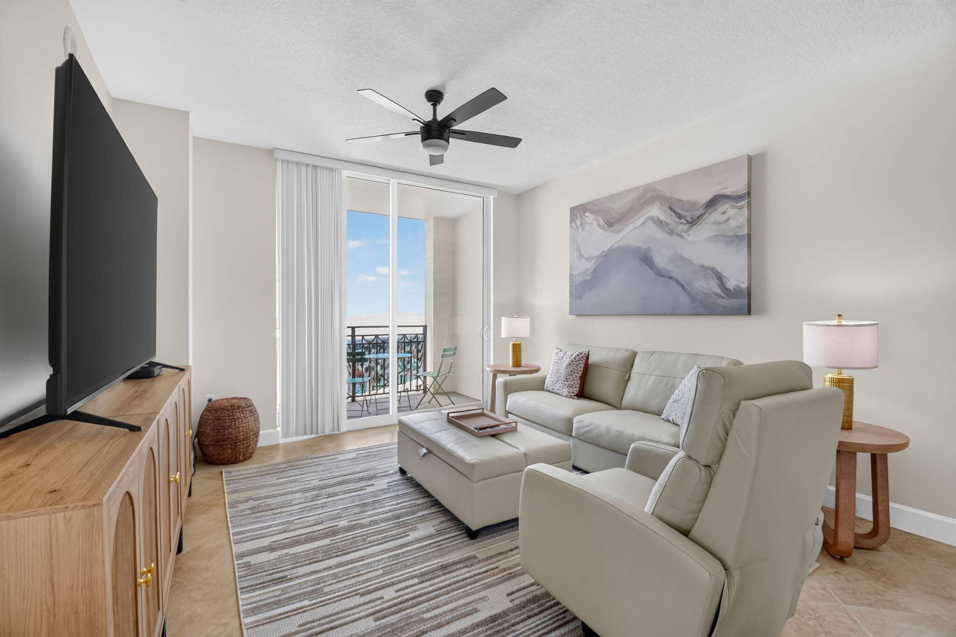 550 OKEECHOBEE Boulevard, #1618, West Palm Beach, West Palm Beach, FL 33401 Spacious living area featuring tile flooring, a ceiling fan, and sliding glass doors to a balcony