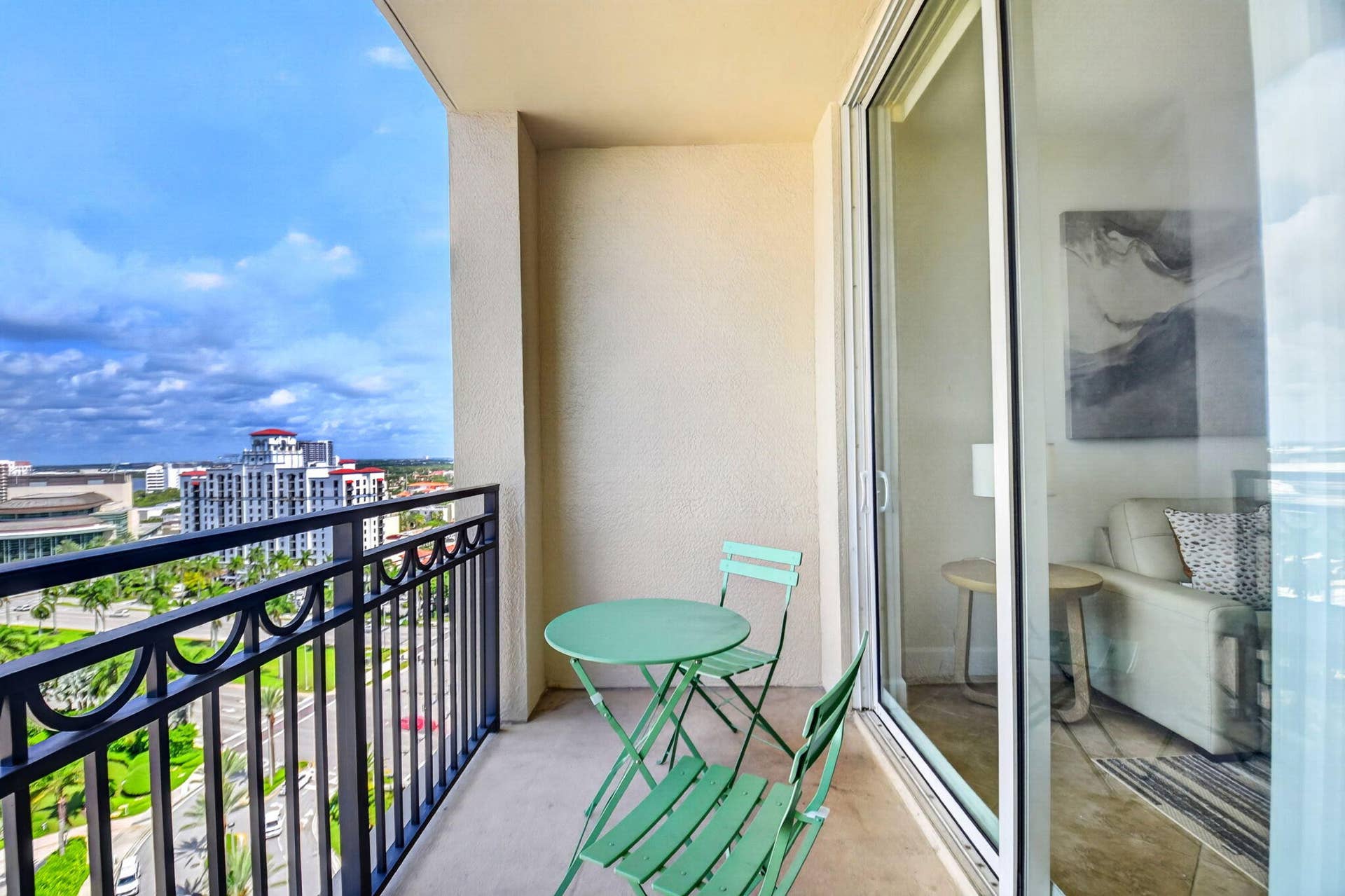 550 OKEECHOBEE Boulevard, #1618, West Palm Beach, West Palm Beach, FL 33401 Balcony with wrought iron railing, concrete flooring, and sliding glass door access