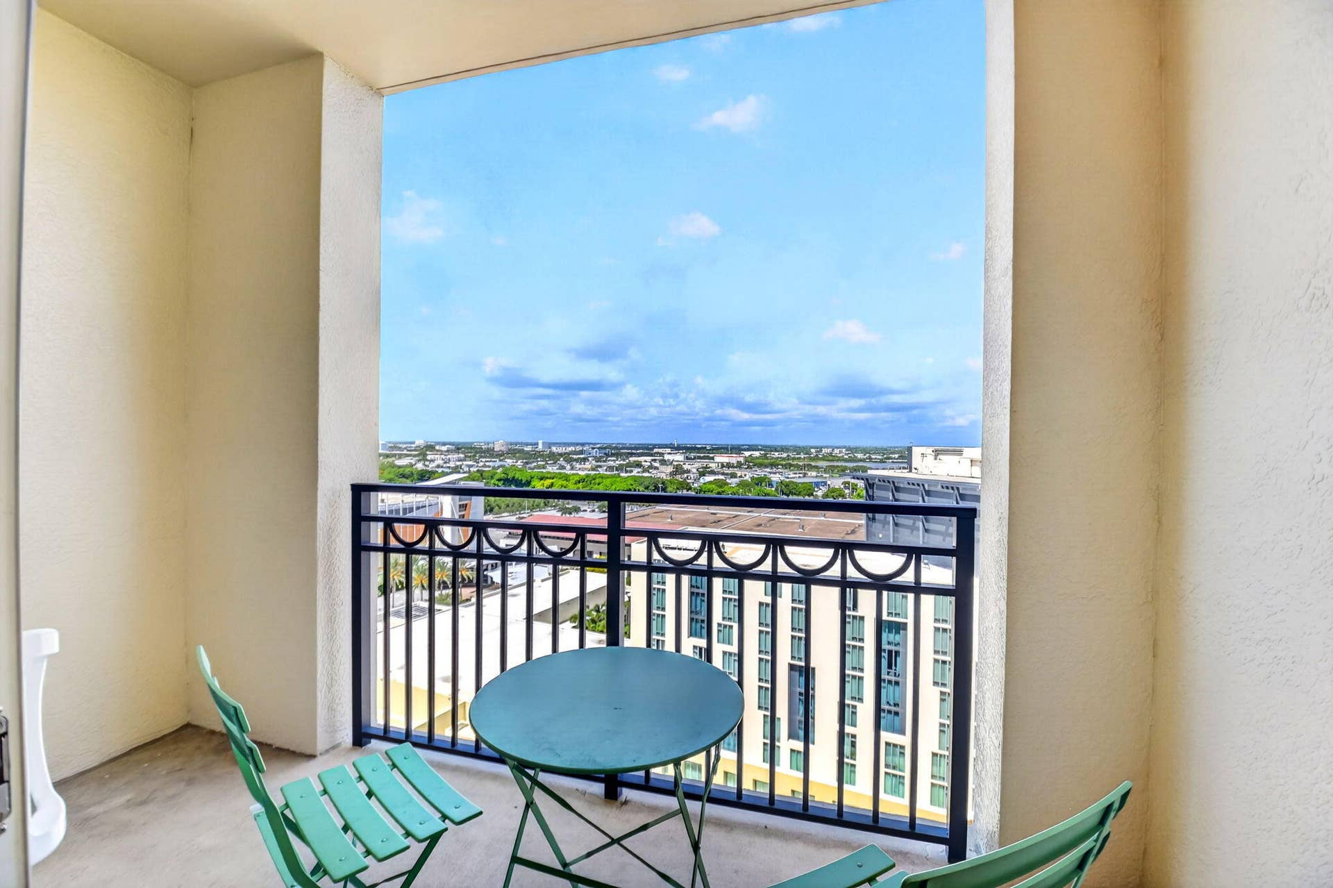550 OKEECHOBEE Boulevard, #1618, West Palm Beach, West Palm Beach, FL 33401 Balcony with black metal railing and concrete flooring