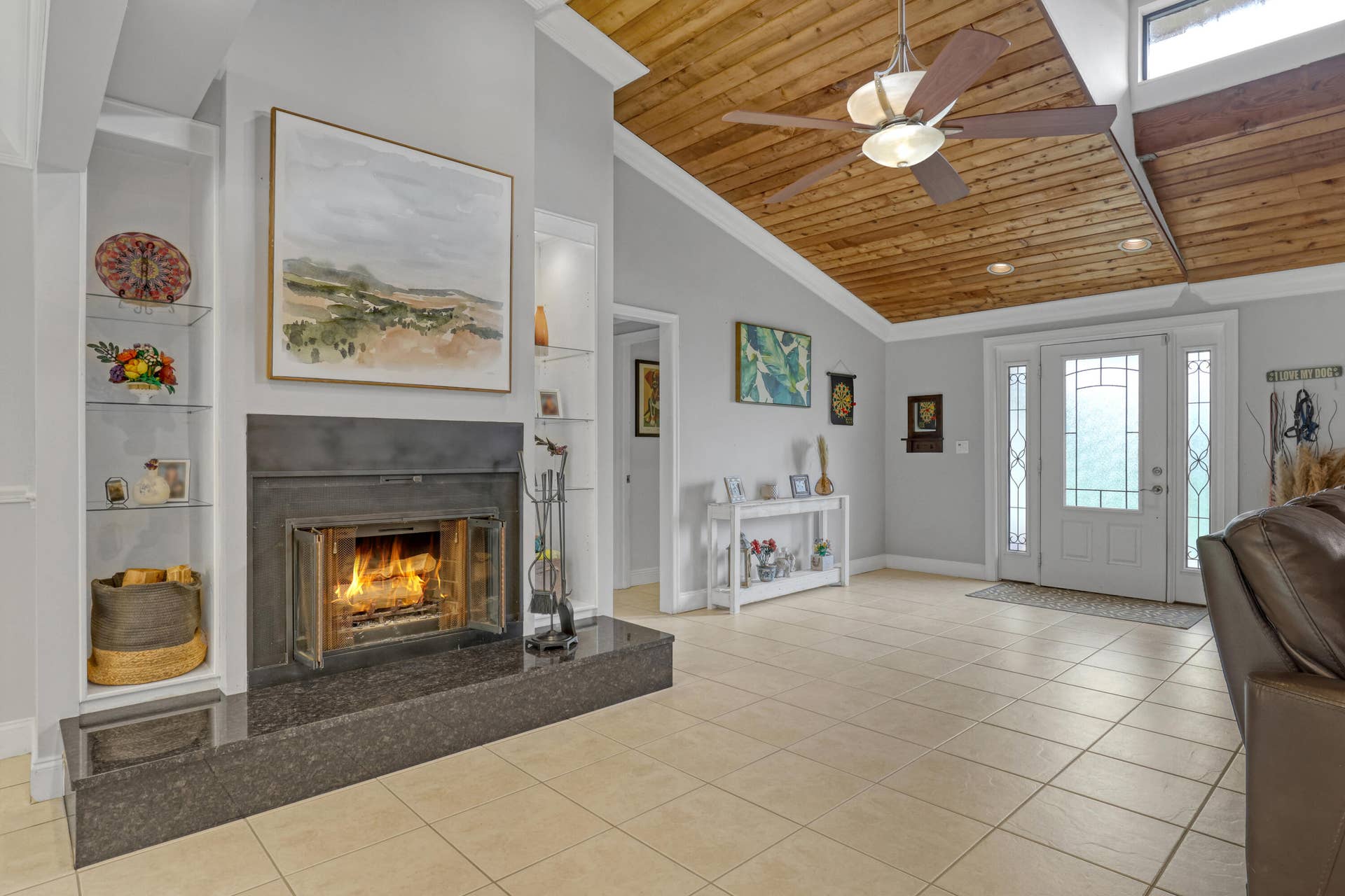15862 121ST Terrace N, Jupiter, FL 33478 living fireplace with fire 15862 121st T