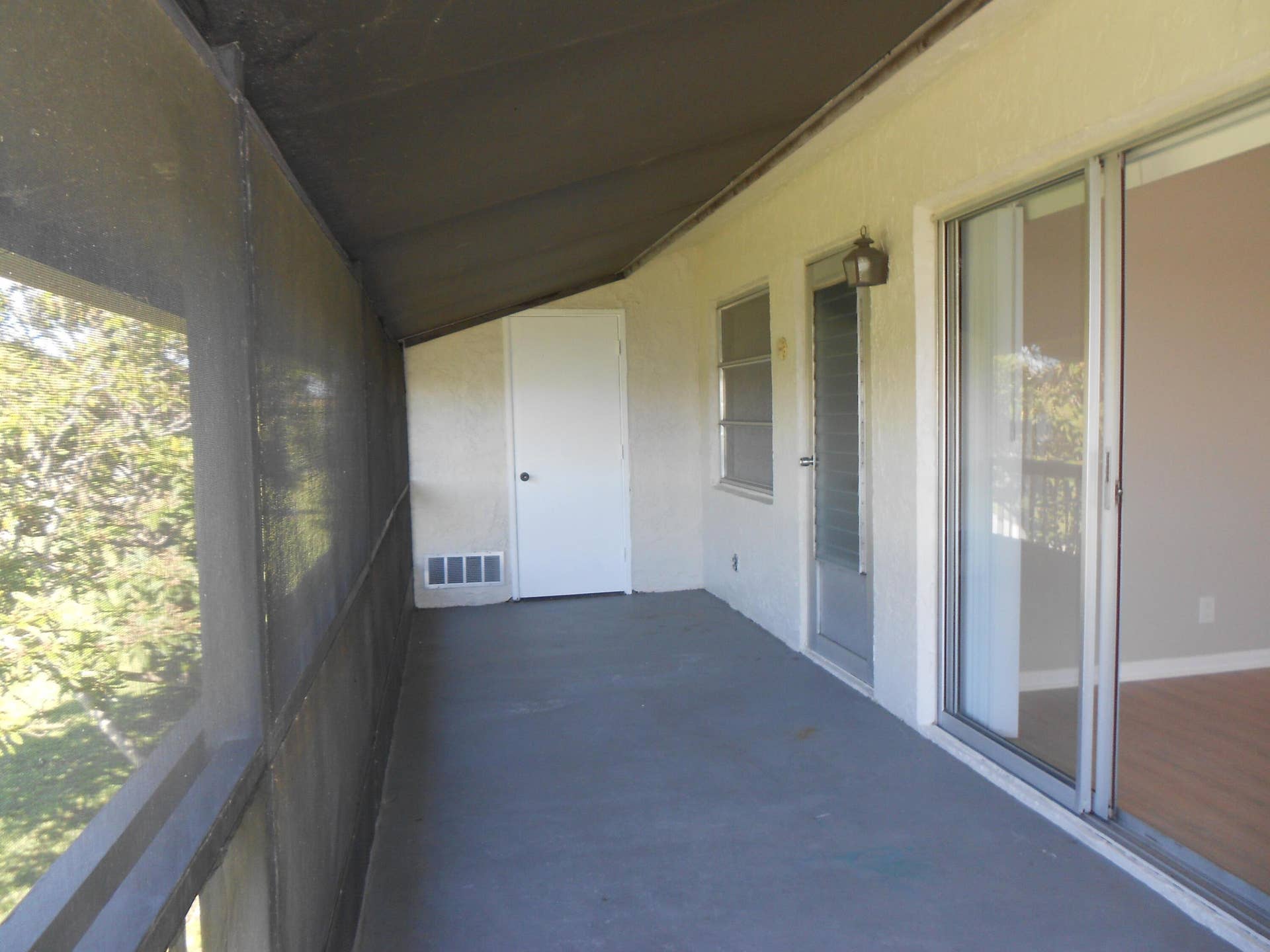 Screened in Patio with Storage Closet