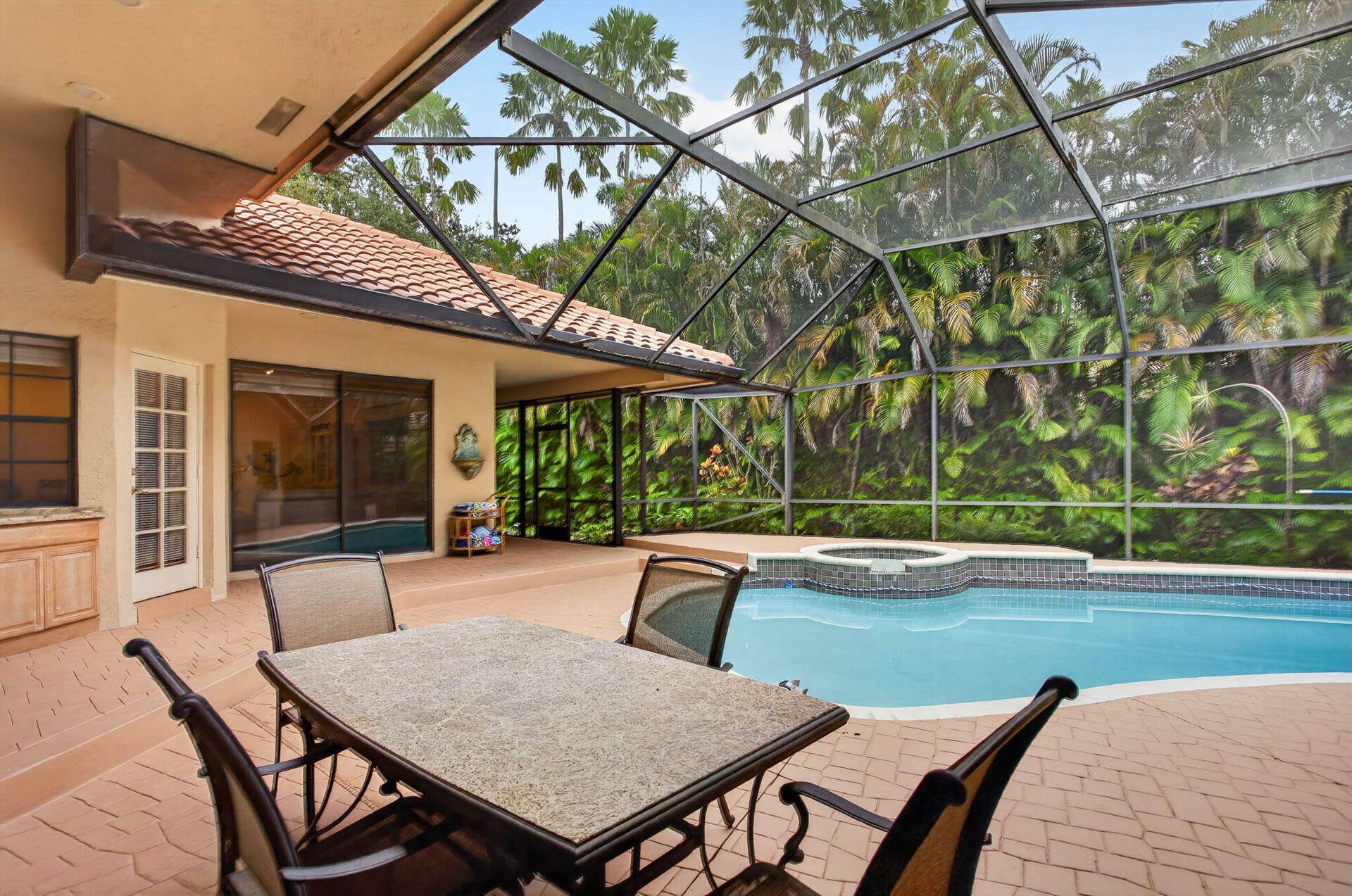 10240 Vestal Court, Coral Springs, FL 33071 Private and serene outdoor poolside and spa.