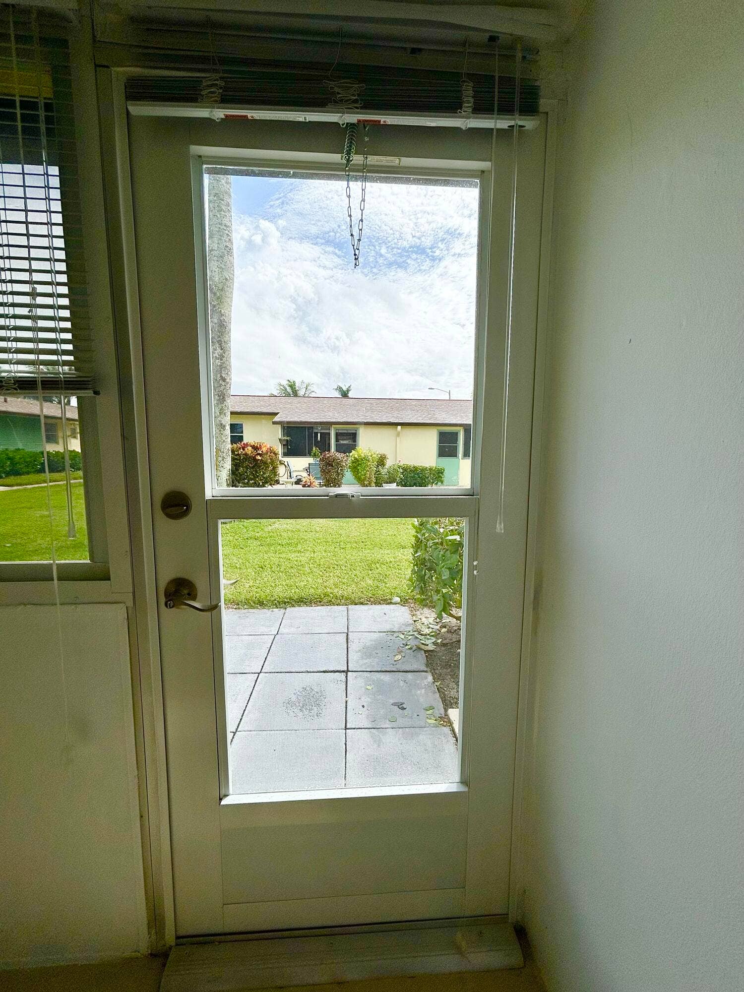 NEWER STORM DOOR