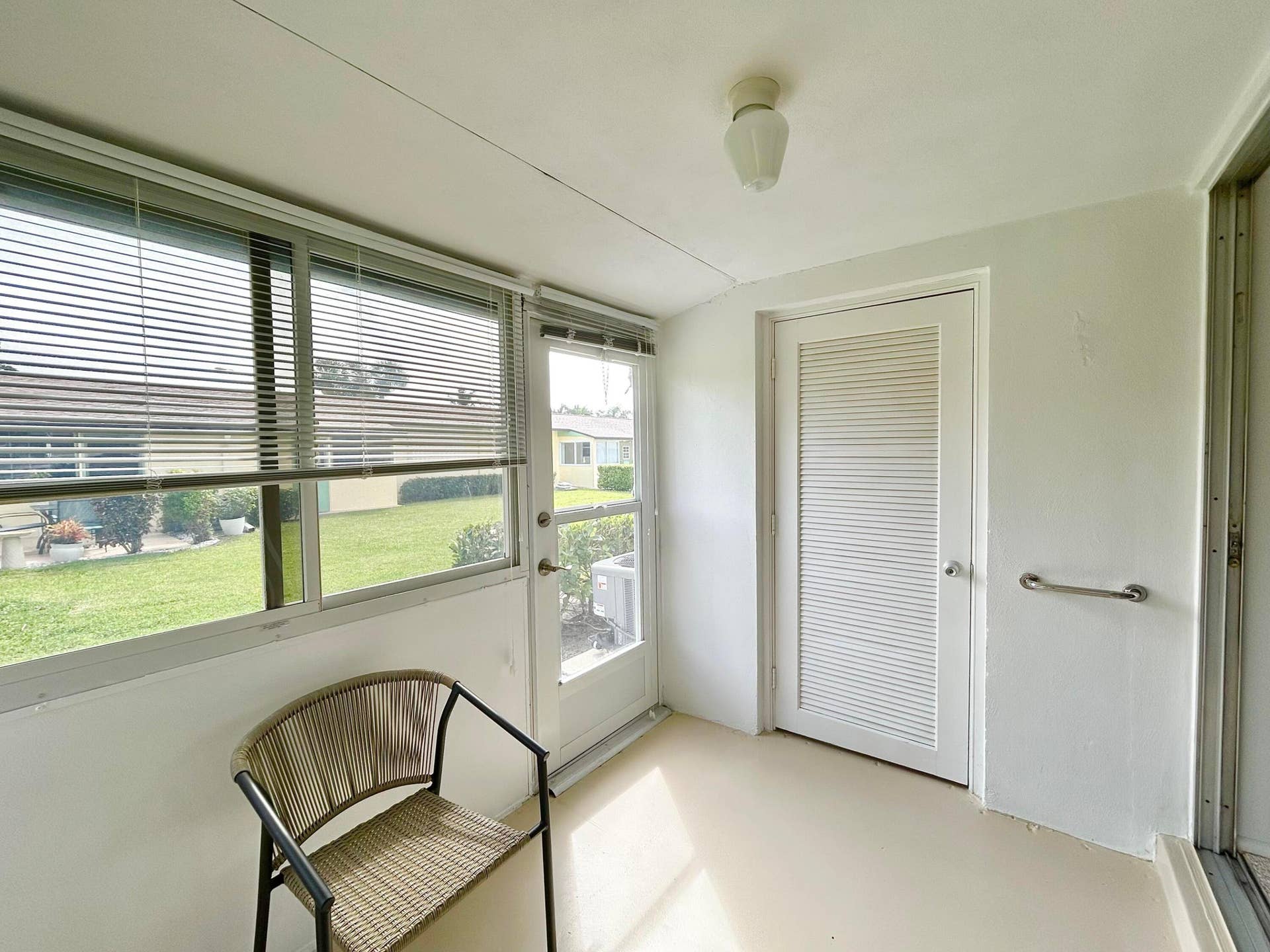 ENCLOSED PORCH W WALK IN STORAGE CLOSET