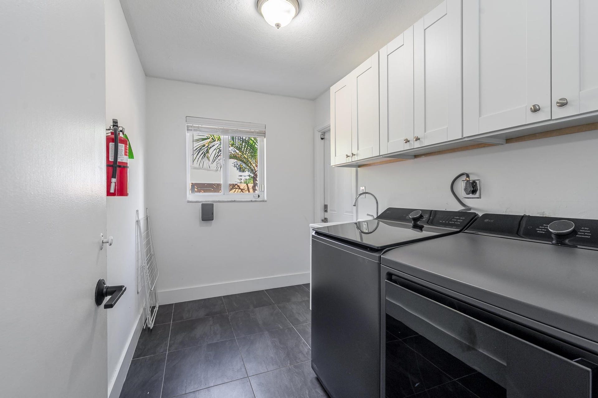 Laundry room with sink
