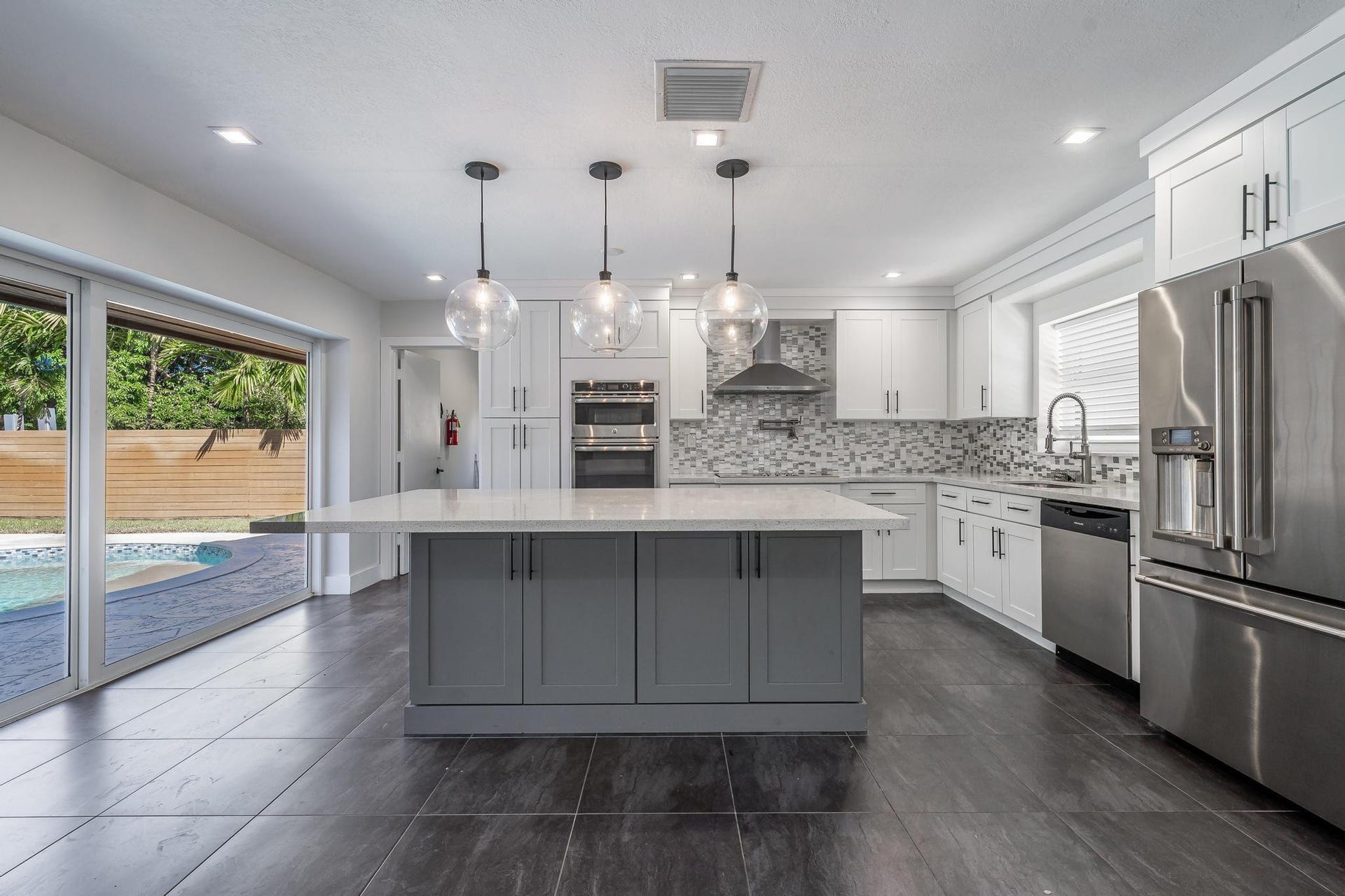 Renovated kitchen with quartz island