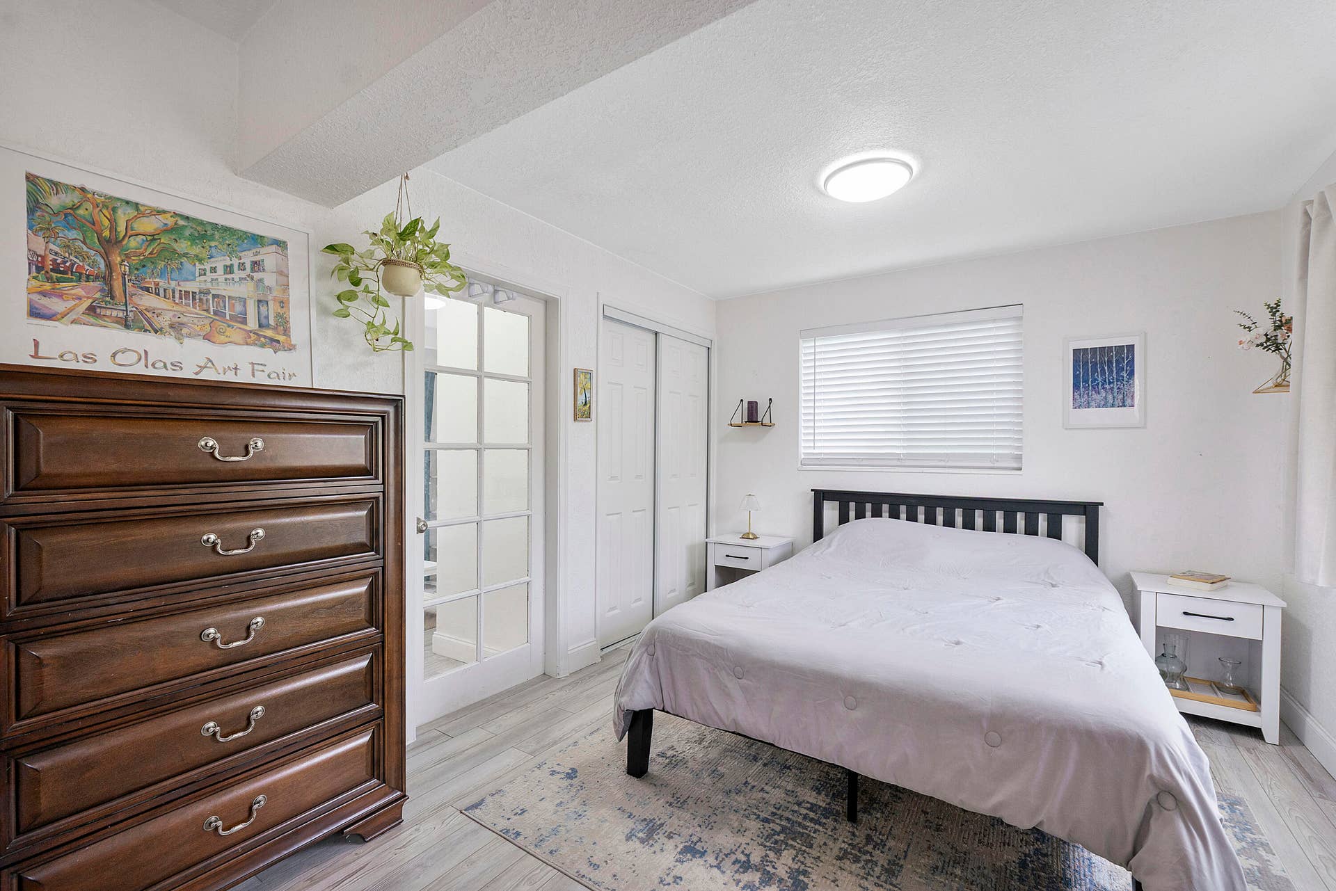 Bedroom with view of French door that leads to sitting room.