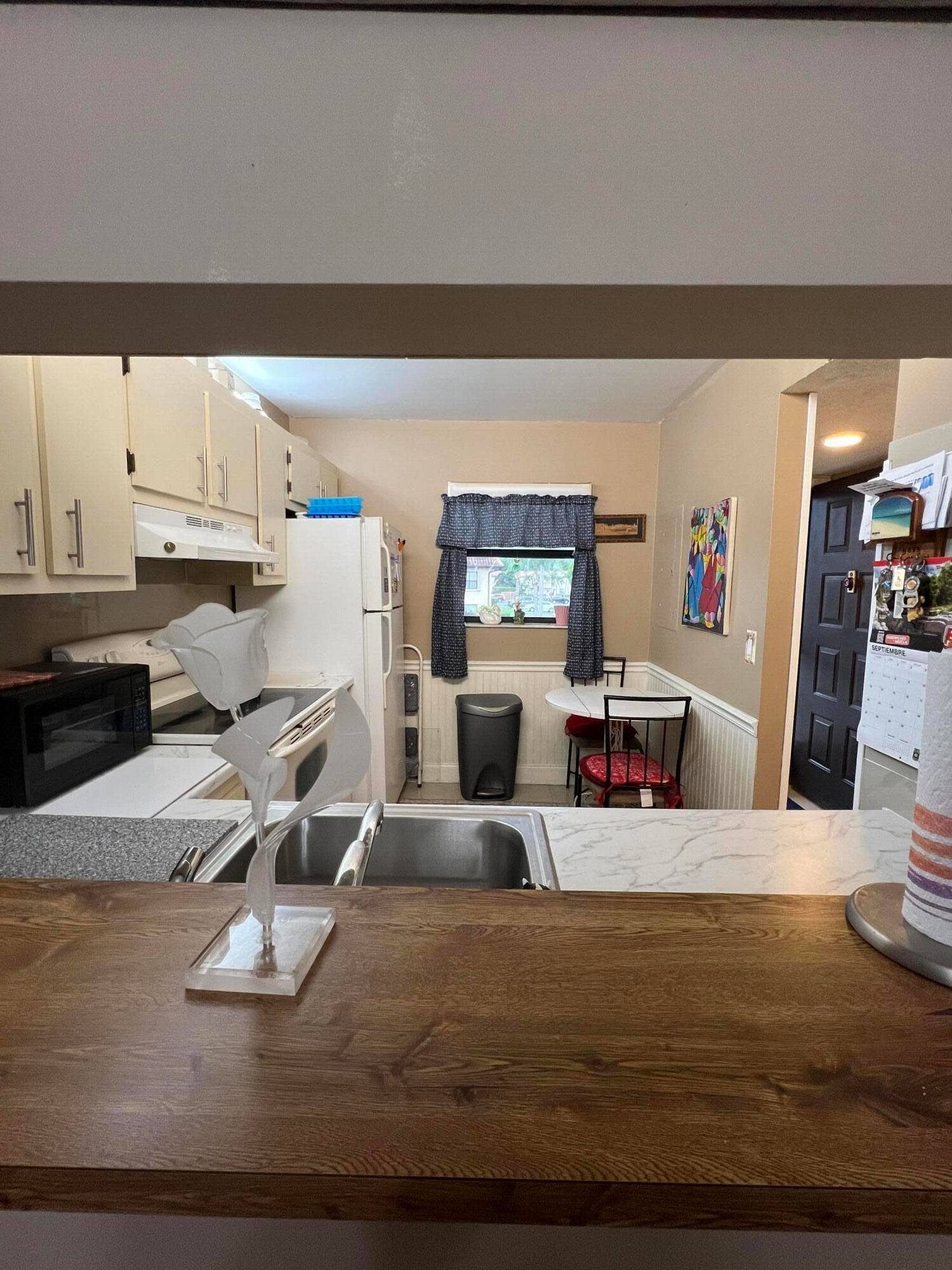 7245 Golf Colony Court, #203, Lake Worth, FL 33467 KITCHEN PASSTHROUGH
