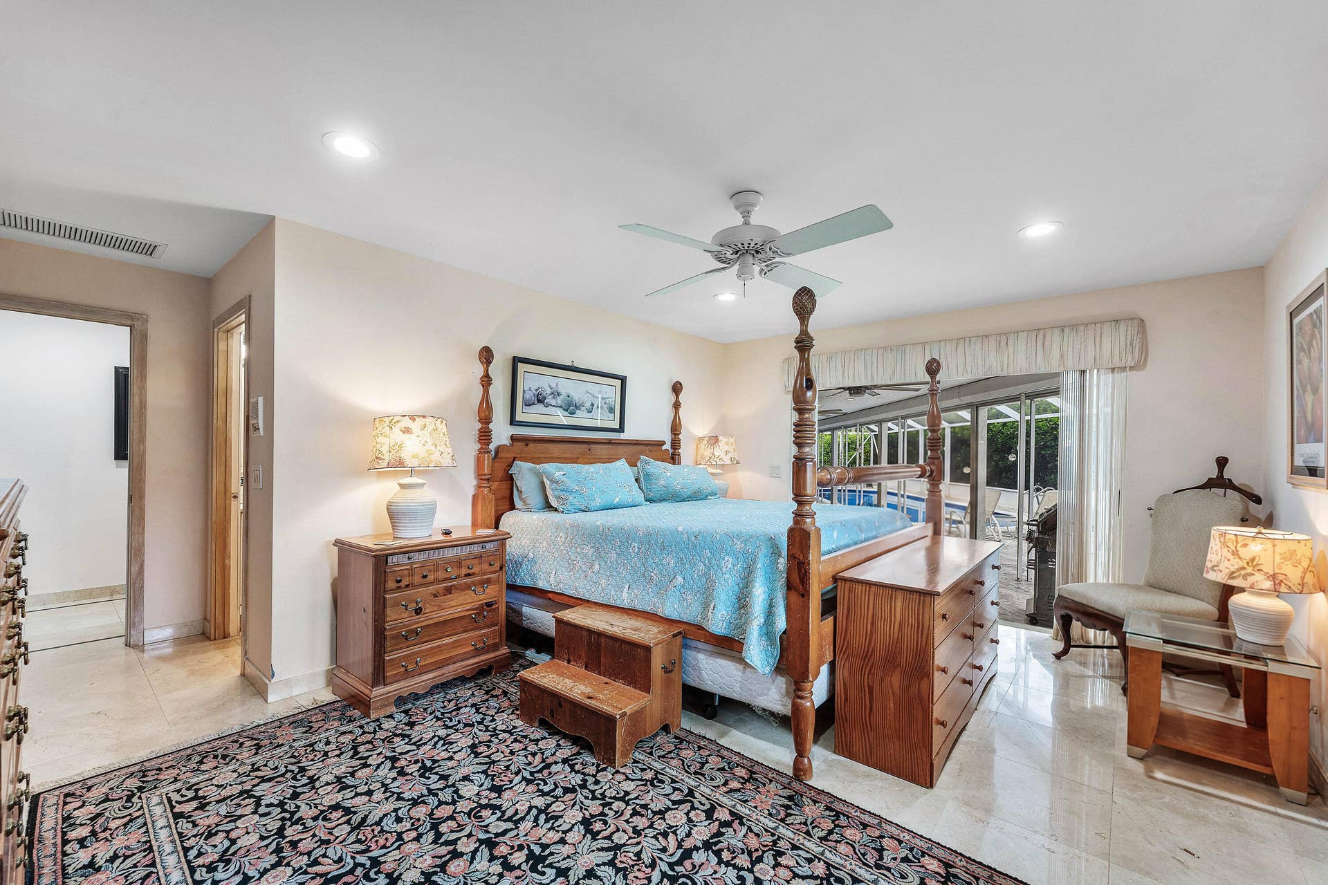 56 NORTHWOODS Lane, Boynton Beach, FL 33436 Recessed lighting, ceiling fan, tile flooring, sliding glass door, and a screened enclosure