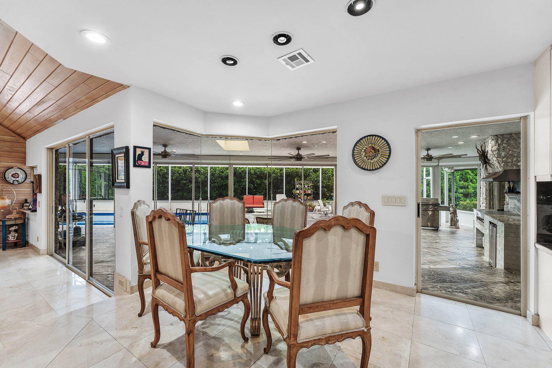 56 NORTHWOODS Lane, Boynton Beach, FL 33436 Recessed lighting illuminating the dining space with tile flooring