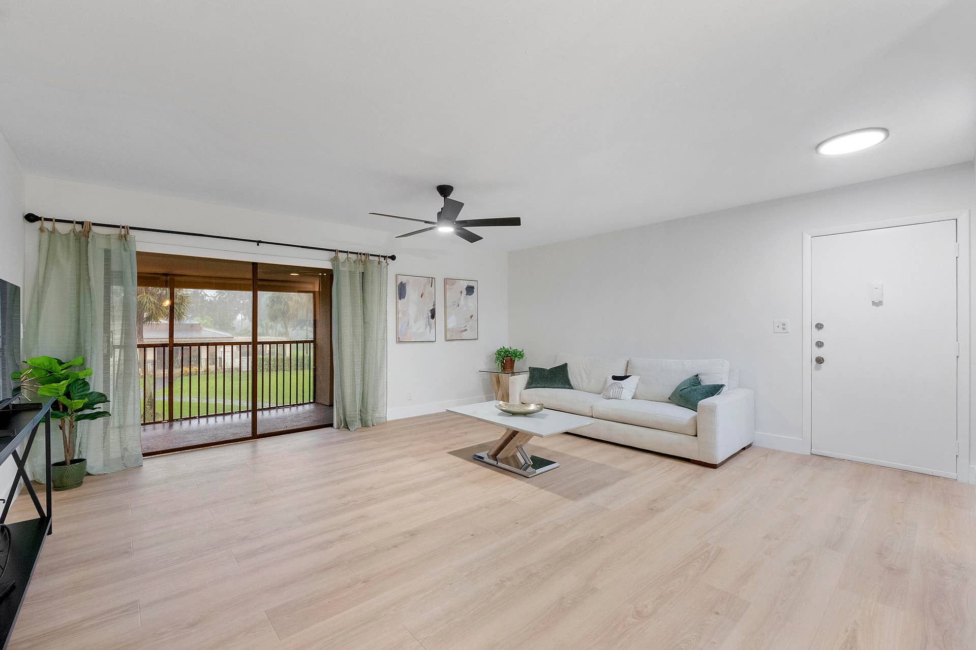 living room with balcony access