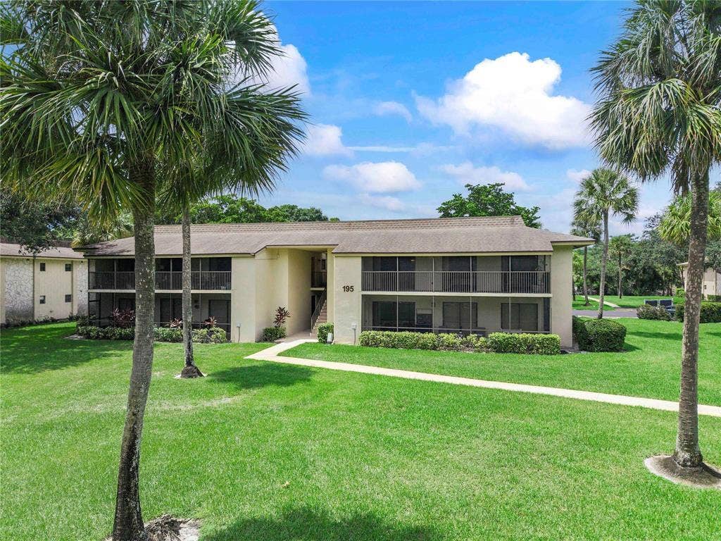 195 DEER CREEK Boulevard, #807, Deerfield Beach, Deerfield Beach, FL 33442 balcony faces away from the parking lot with a nice green view