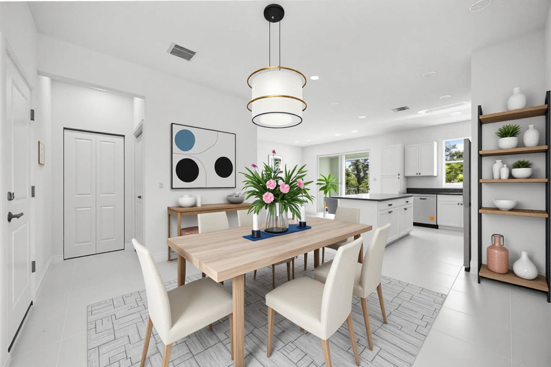 Open-concept floor plan featuring a dining area, kitchen island, and built-in shelving