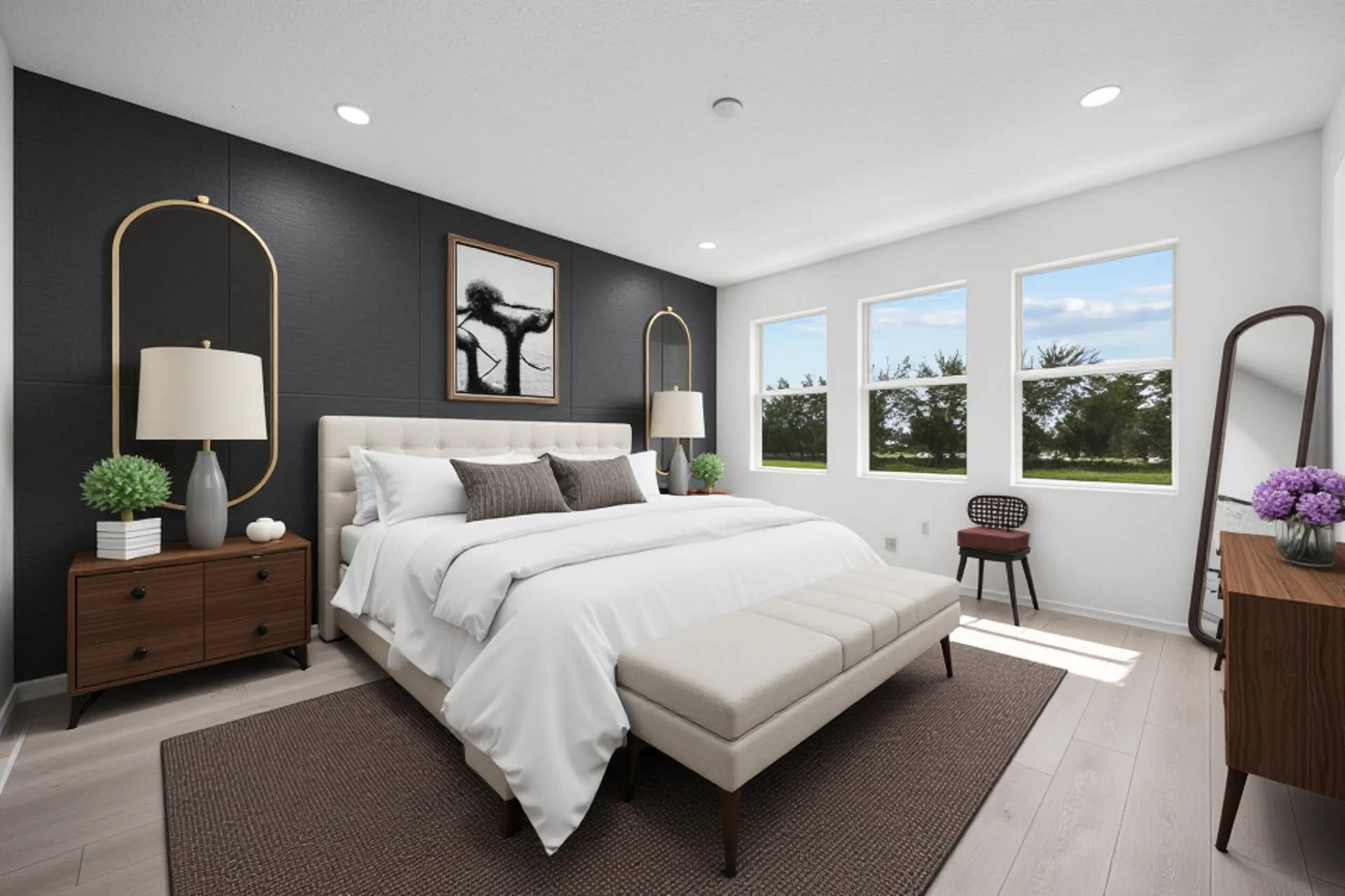 Recessed lighting, light-toned wood-finish flooring, accent wall paneling, and multiple windows