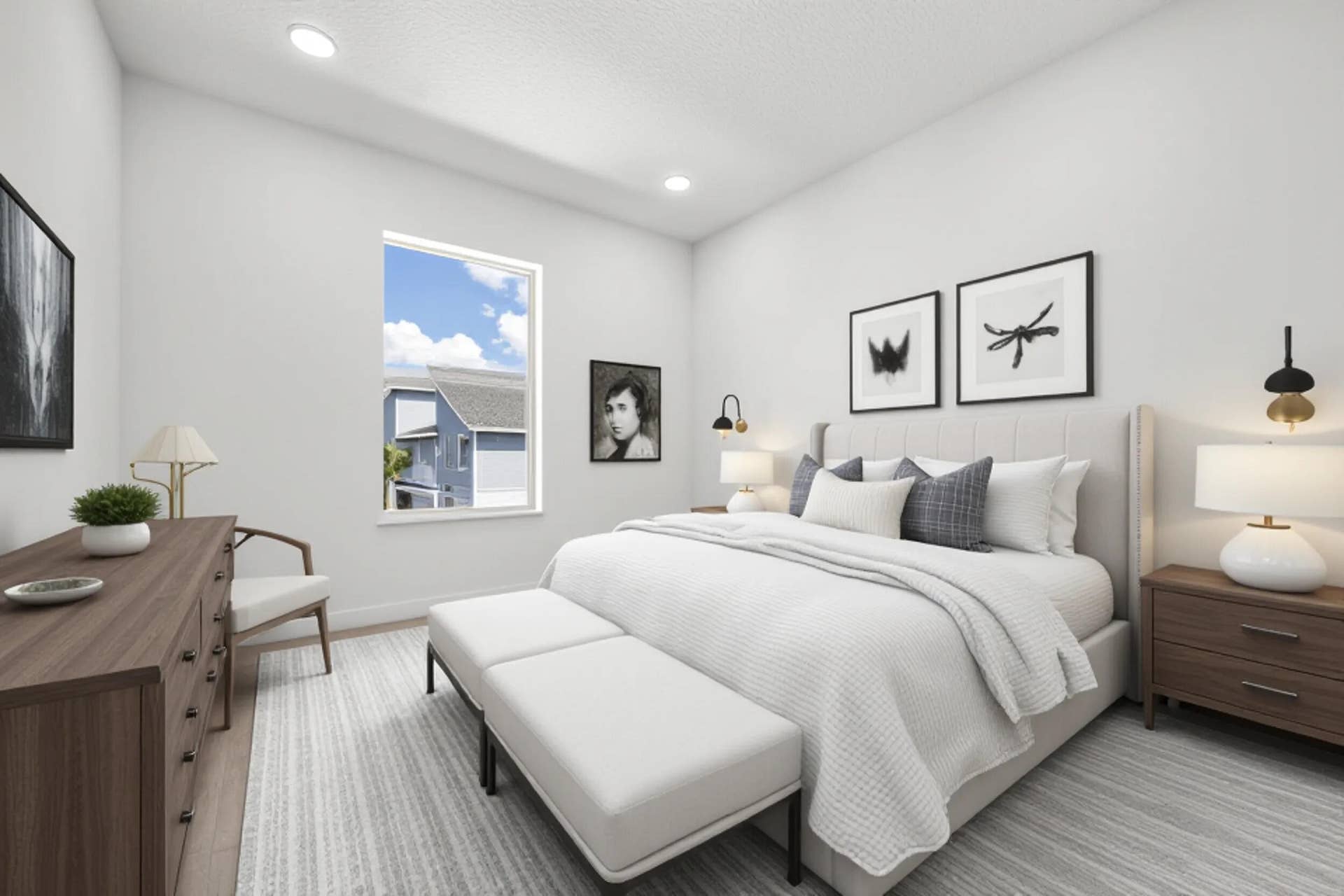 Recessed lighting, wood-finish flooring, and a large window providing natural illumination