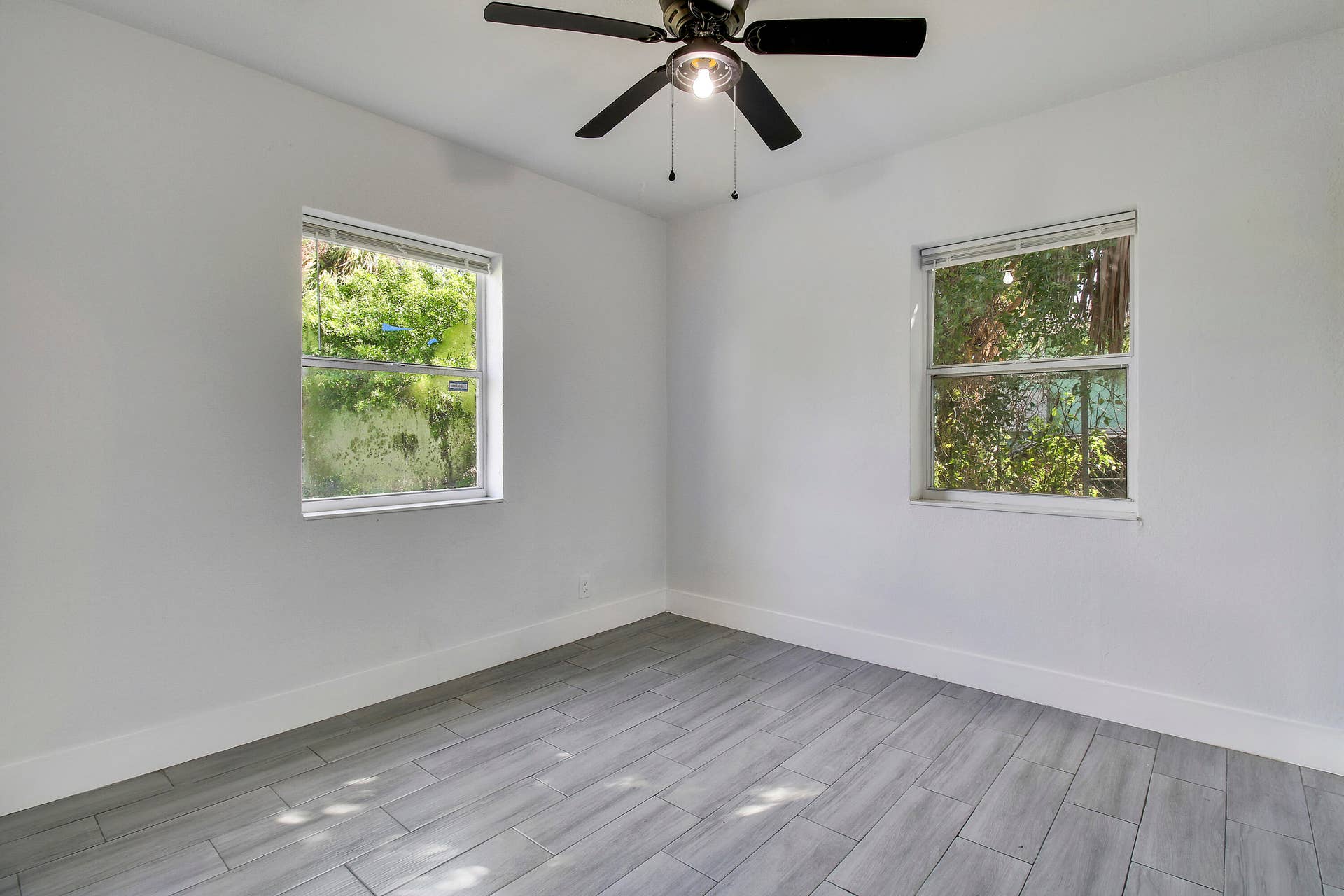 Light gray wood-look tile flooring