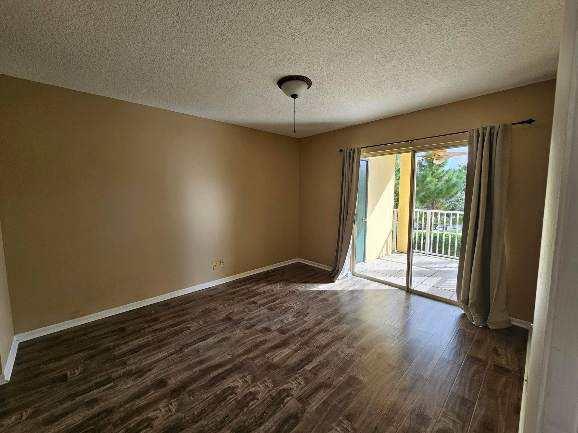 Master bedroom with balcony view