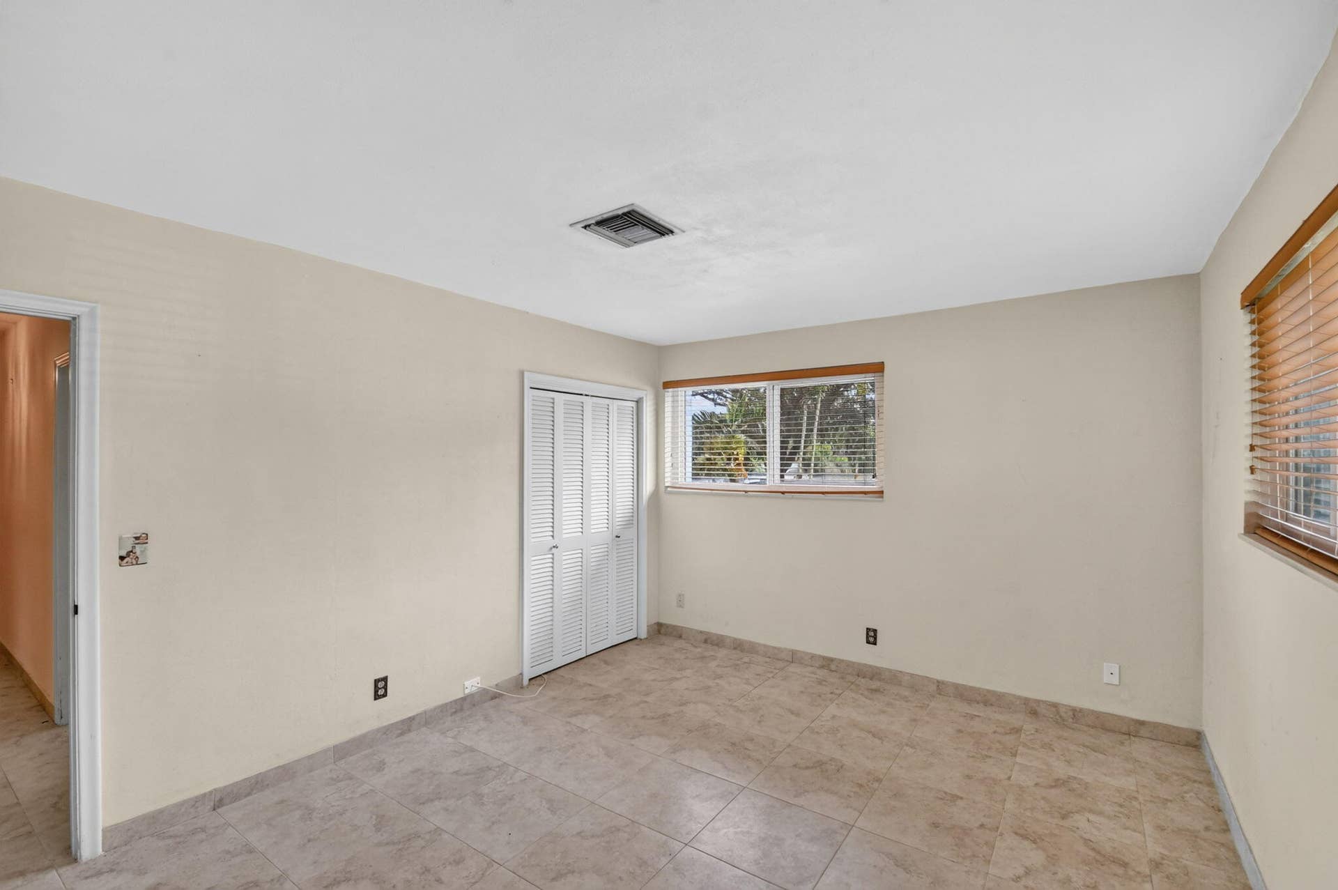 Neutral tone walls with tile flooring