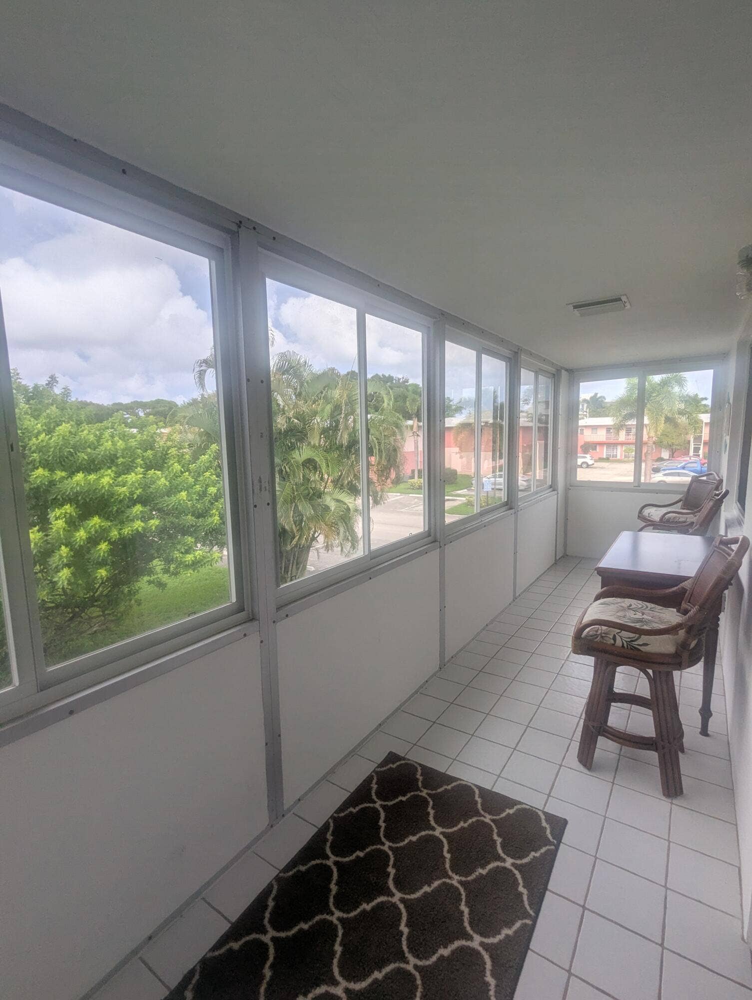 Tiled Enclosed Balcony w Impact Windows