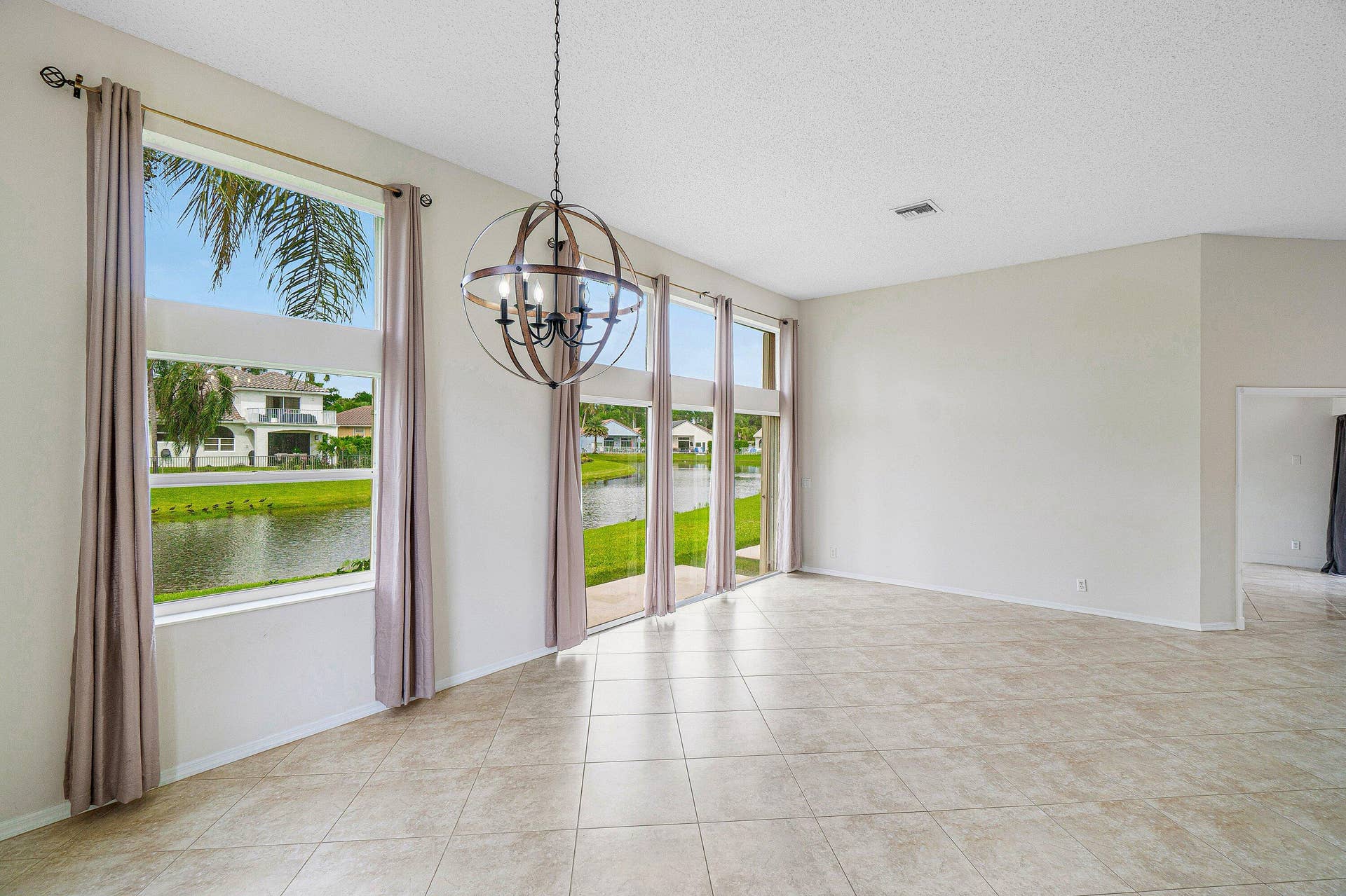 10599 Saint Thomas Drive, Boca Raton, FL 33498 living/dining room
