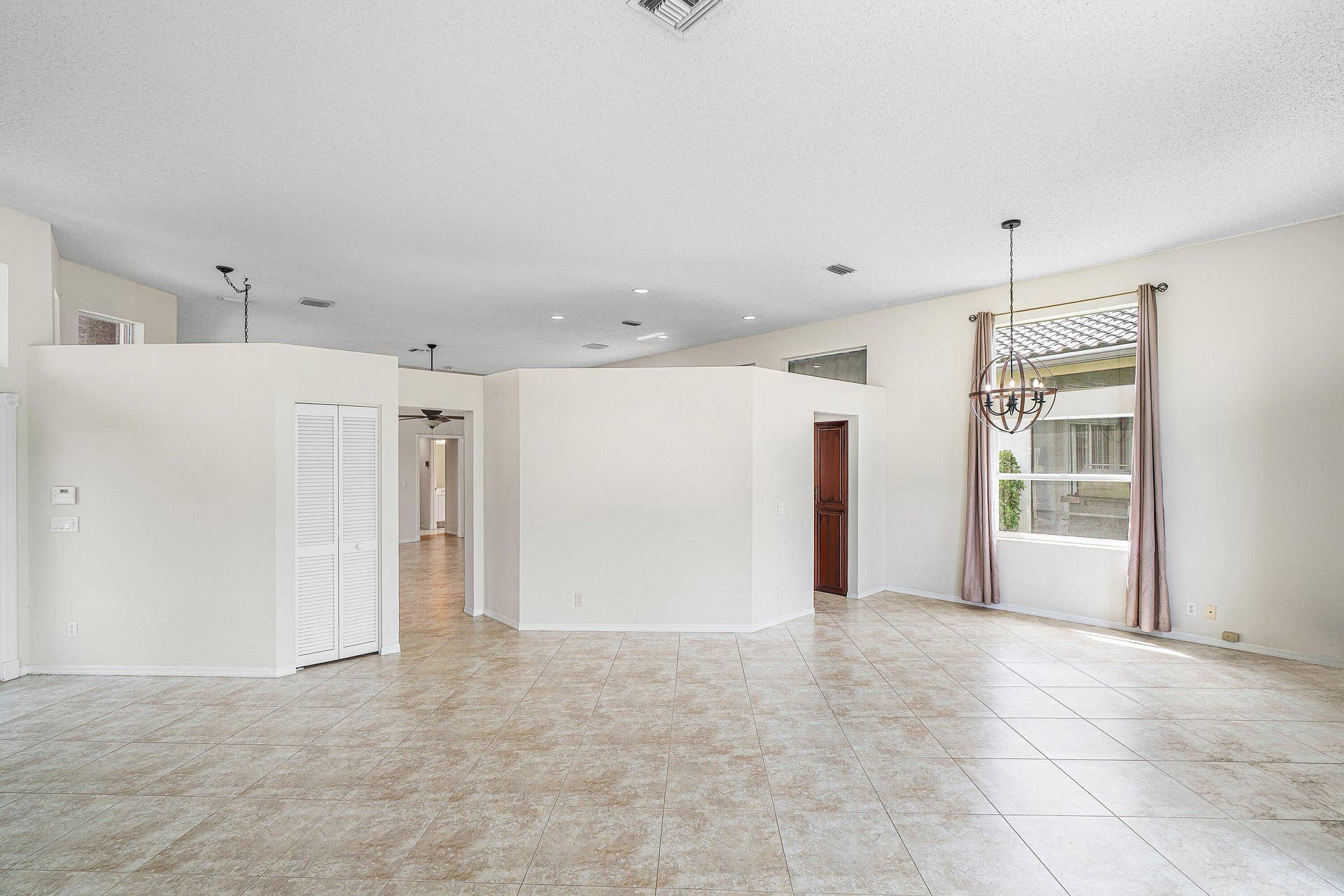 10599 Saint Thomas Drive, Boca Raton, FL 33498 living/dining room
