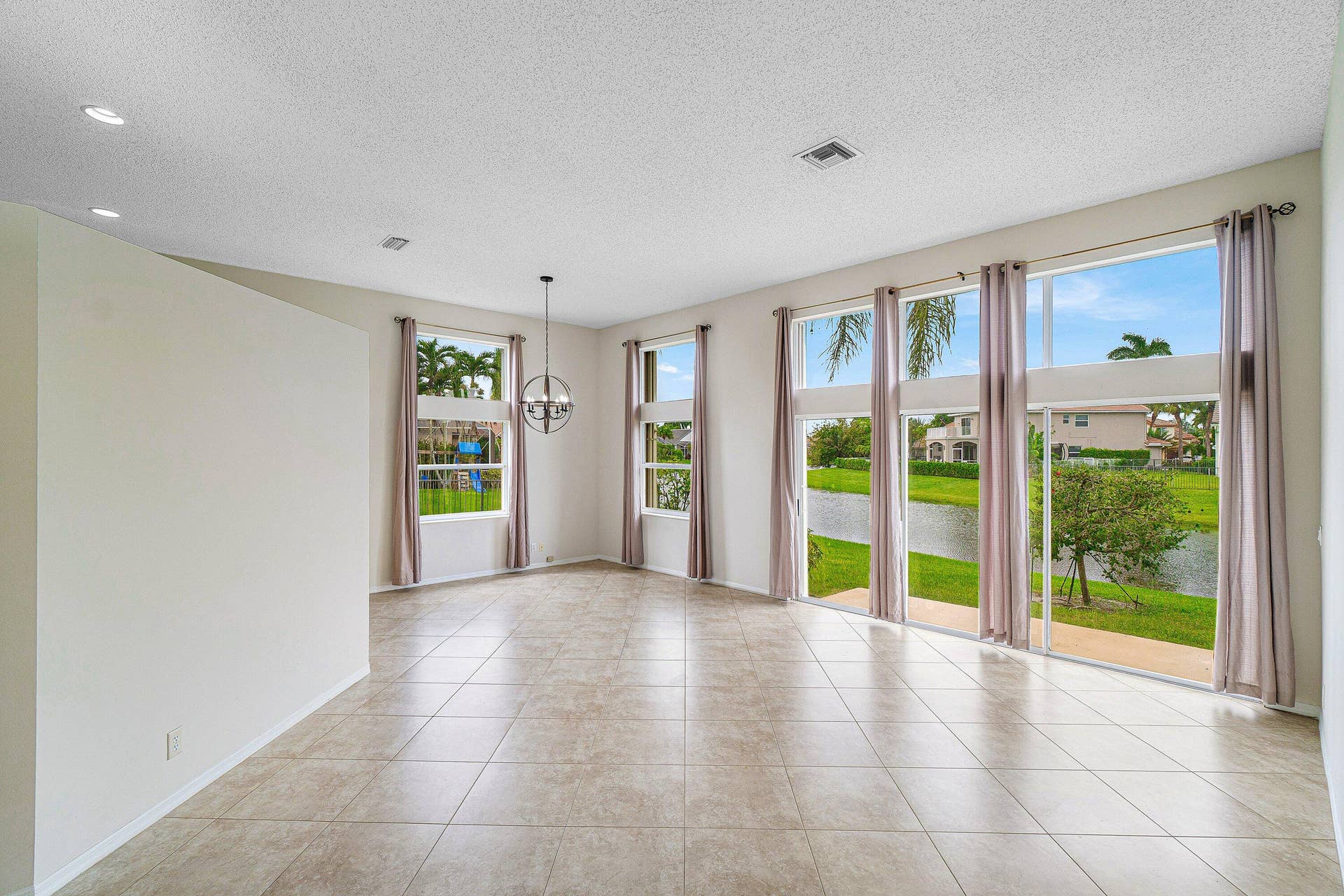 10599 Saint Thomas Drive, Boca Raton, FL 33498 living/dining
