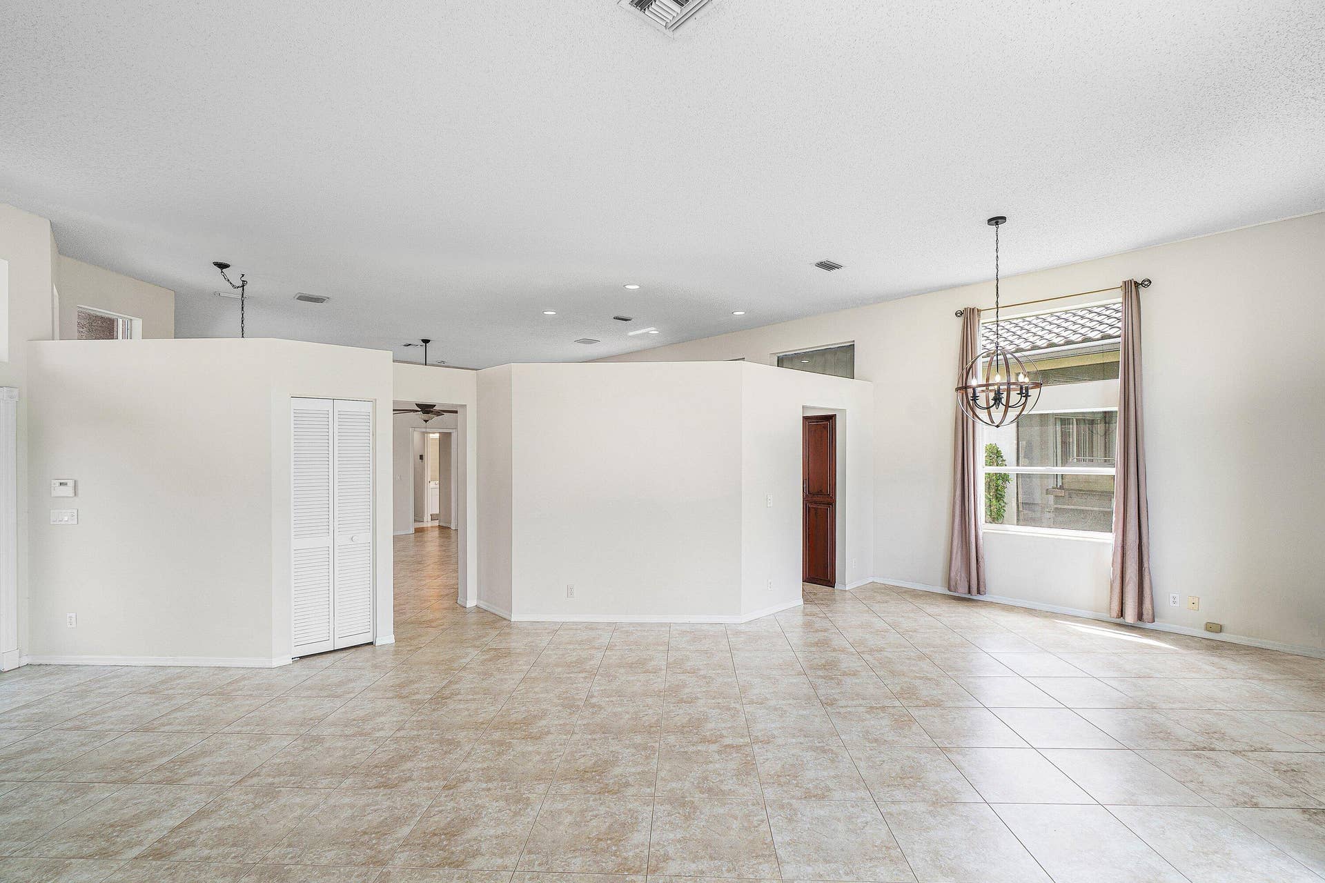 10599 Saint Thomas Drive, Boca Raton, FL 33498 living/dining room