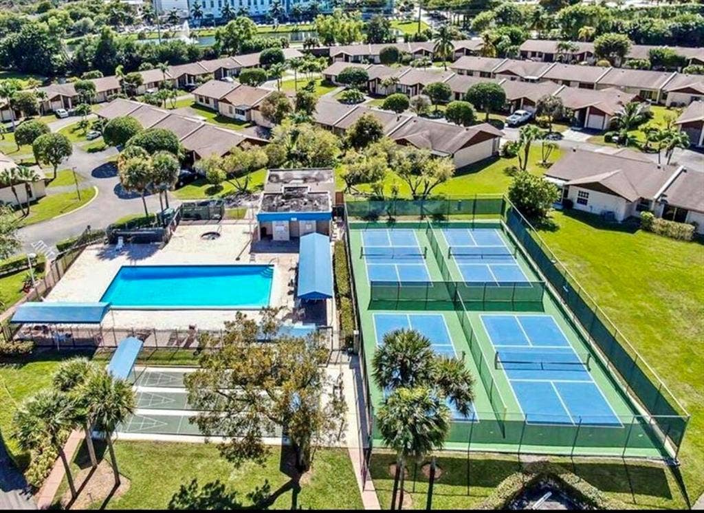 5130 Las Verdes Circle, #121, Delray Beach, FL 33484 Overhead Viburnum Pool n Pickleball Cour