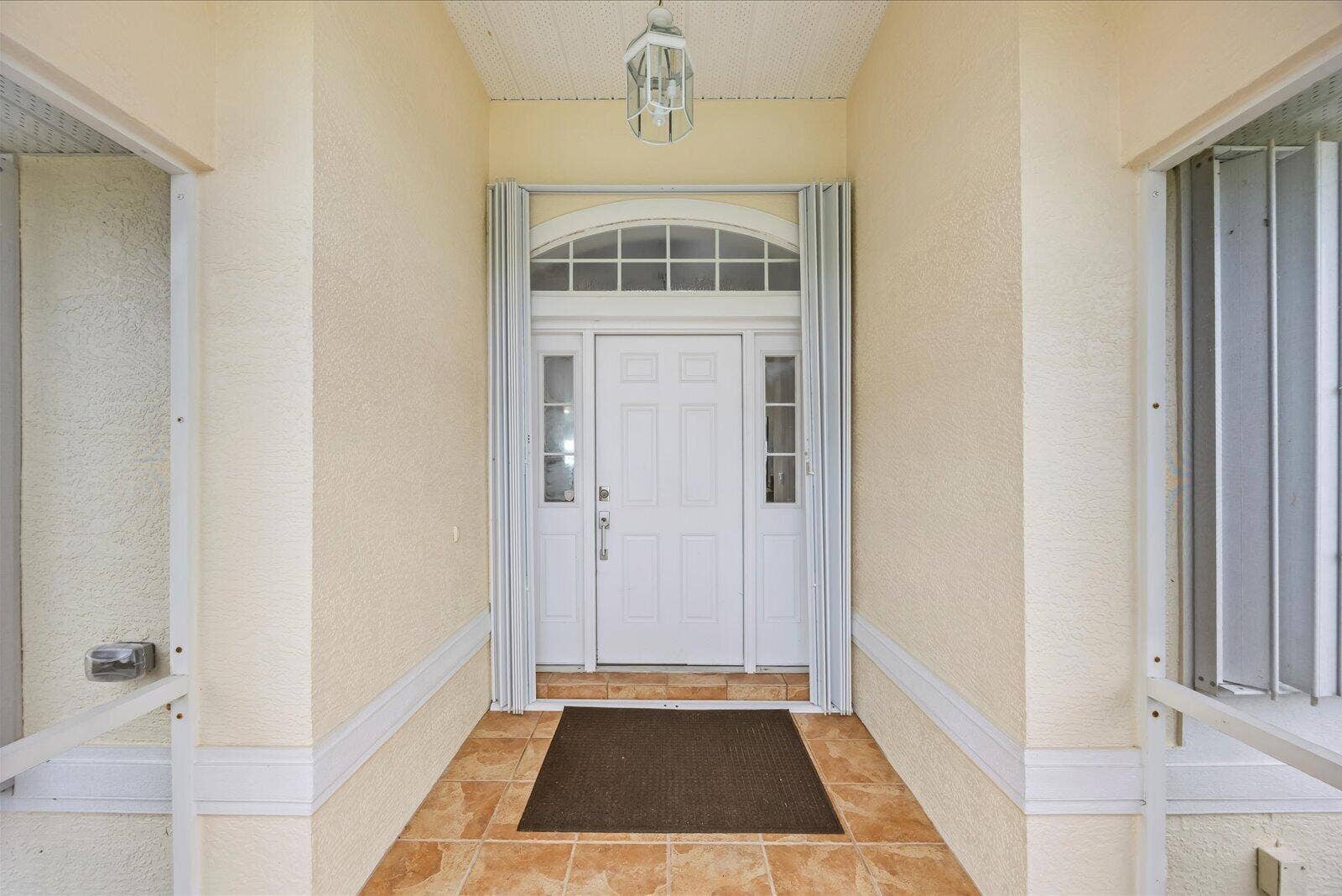 122 Queen Frederika Court, Hutchinson Island, FL 34949 Front Door