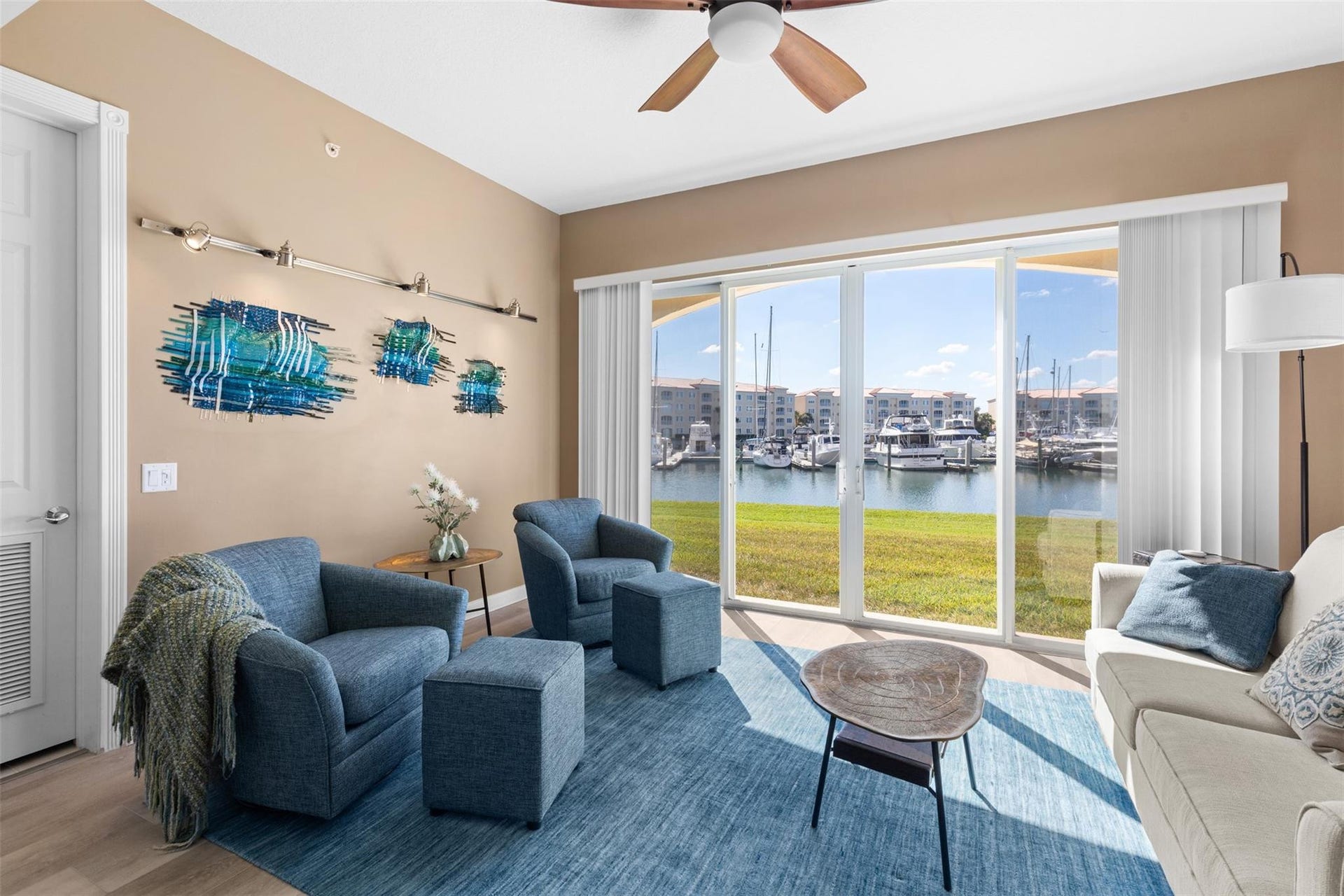 9 HARBOUR ISLE Drive E, #102, Fort Pierce, FL 34949 Custom glass art included with picture lighting
