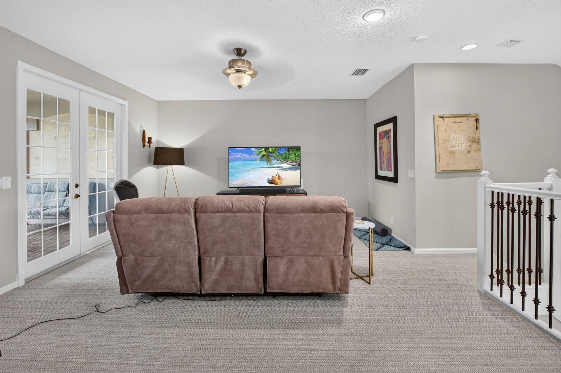 6610 Aston Lane, Boynton Beach, FL 33437 Carpeted flooring, white French doors, ceiling-mounted light fixture, and a white and black staircase railing