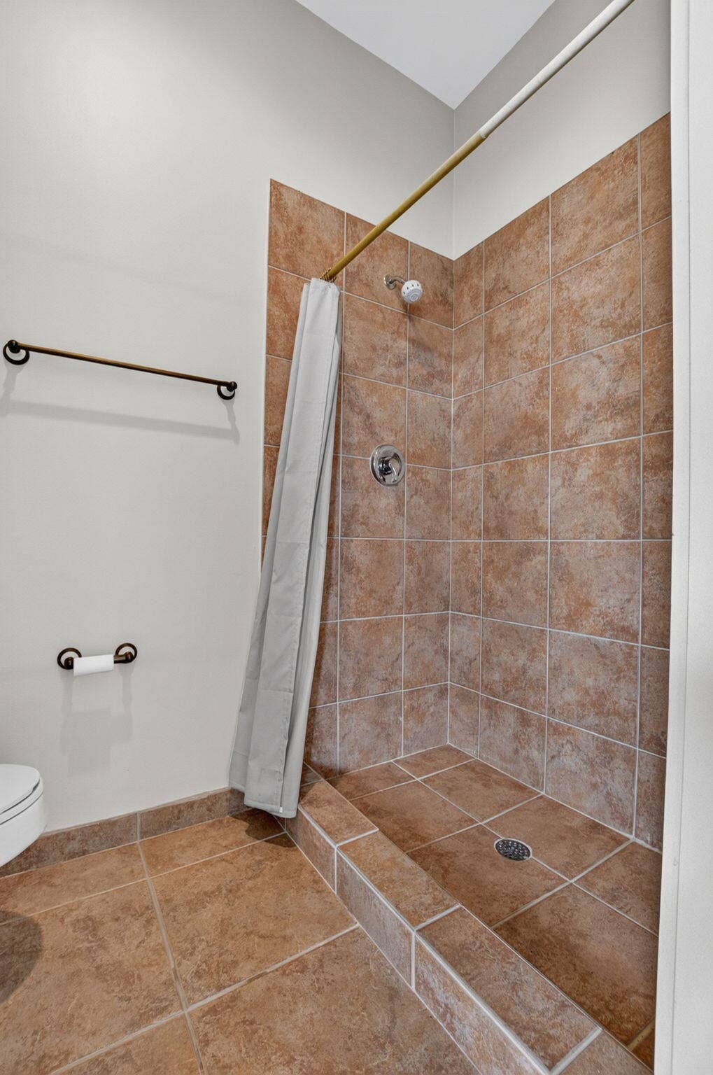6610 Aston Lane, Boynton Beach, FL 33437 Screened in Patio has a Full Cabana Bathroom Tiled shower with a low threshold entry