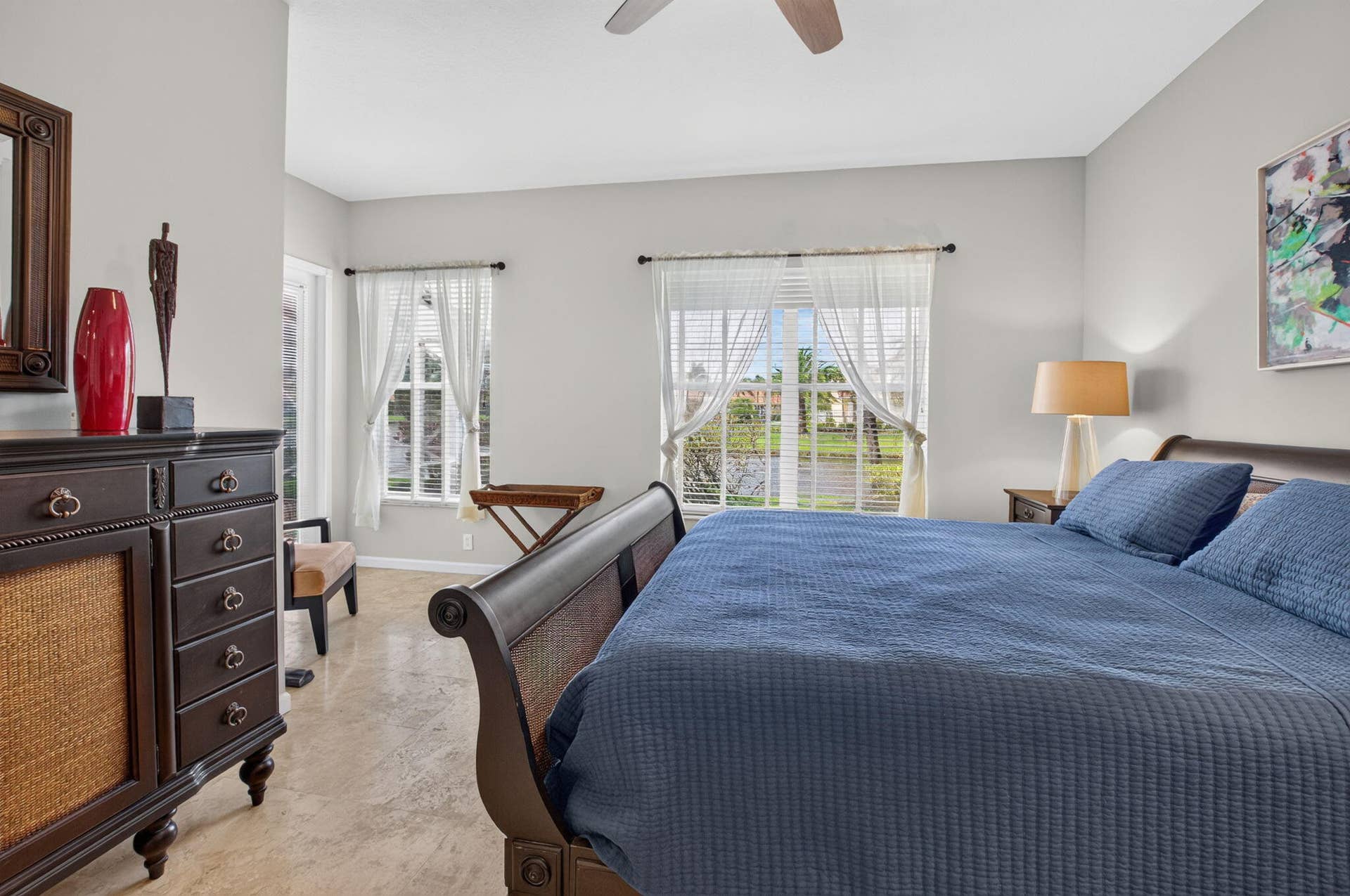 6610 Aston Lane, Boynton Beach, FL 33437 High ceilings, multiple windows with white blinds, and light-toned walls
