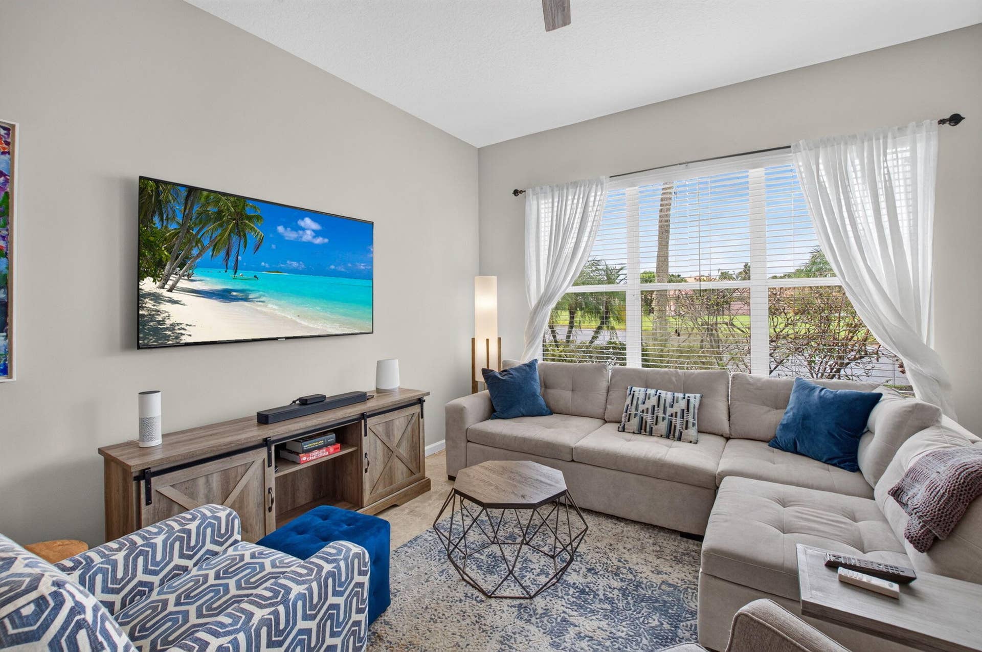 6610 Aston Lane, Boynton Beach, FL 33437 Spacious living area featuring a vaulted ceiling and a large window with white blinds