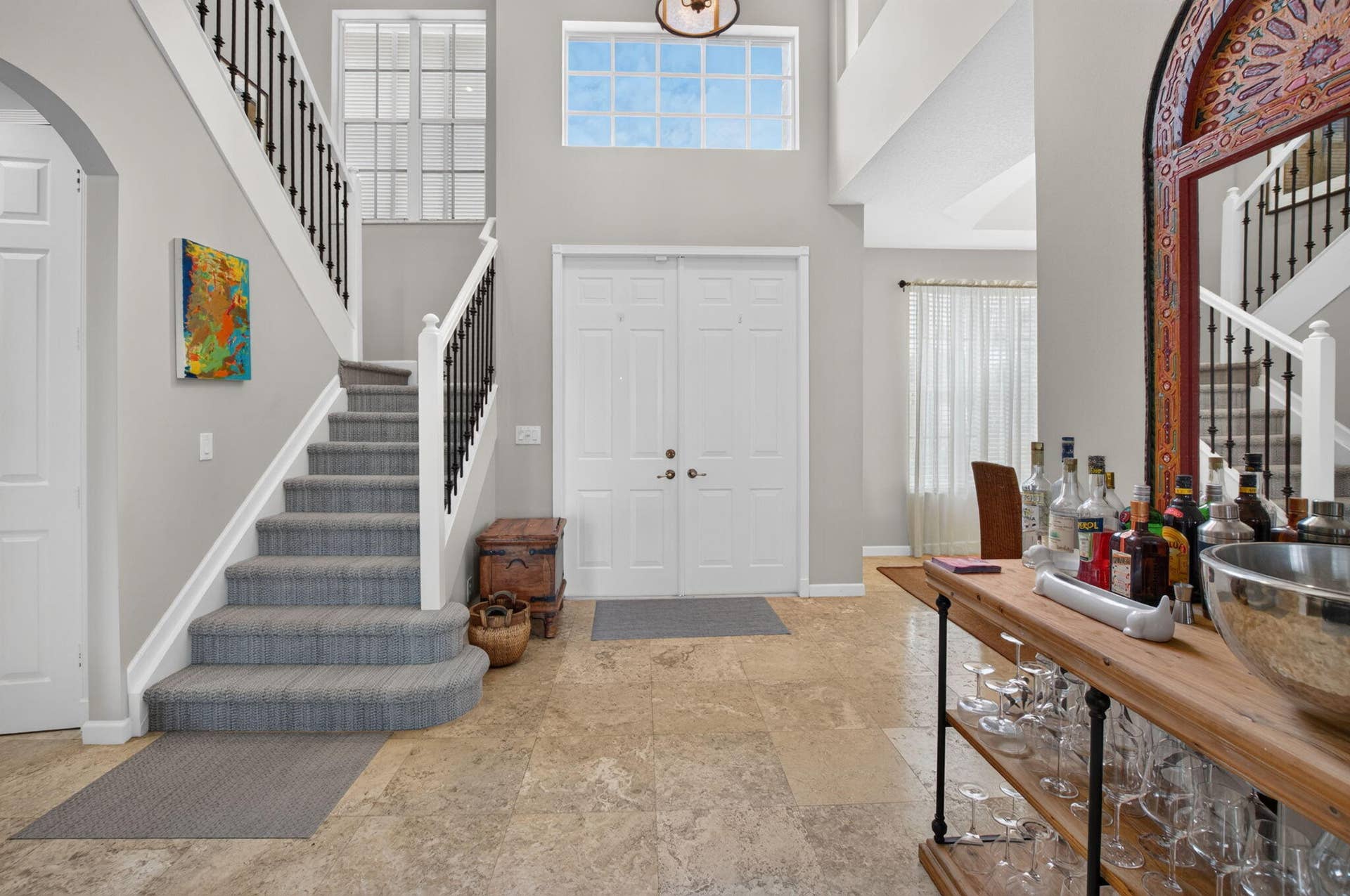 6610 Aston Lane, Boynton Beach, FL 33437 Newer Plush Soft & Super Cushioned Beautiful Patterned Carpet. Two-story foyer with a double-door entry, a grand staircase with wrought iron balusters, and transom windows