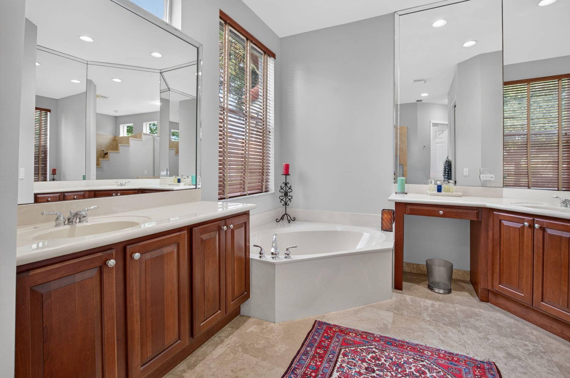6610 Aston Lane, Boynton Beach, FL 33437 Dual wood-finish vanities with integrated sinks and light countertops