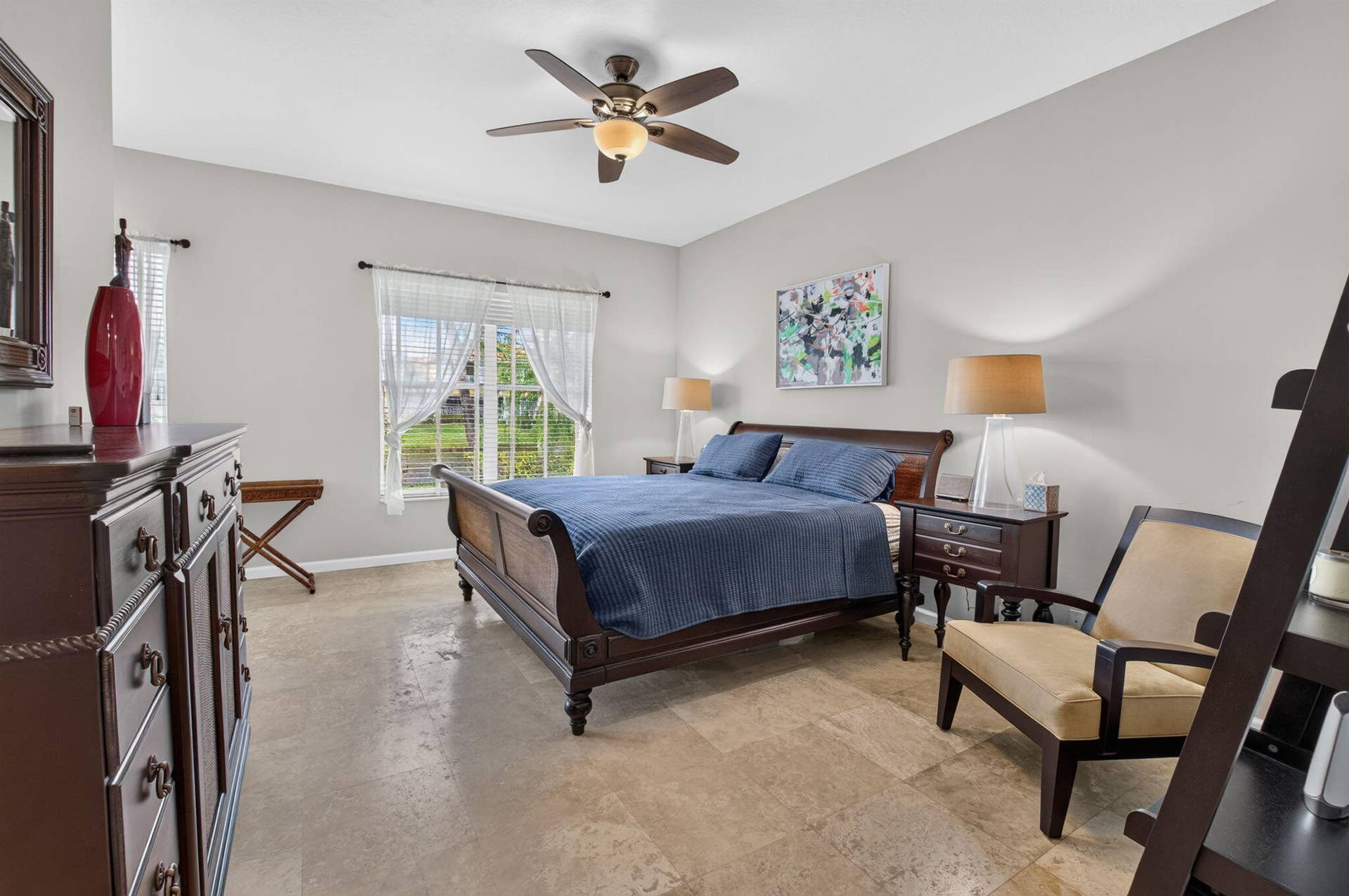 6610 Aston Lane, Boynton Beach, FL 33437 Vaulted ceiling with a ceiling fan, recessed window, and light-toned tile flooring