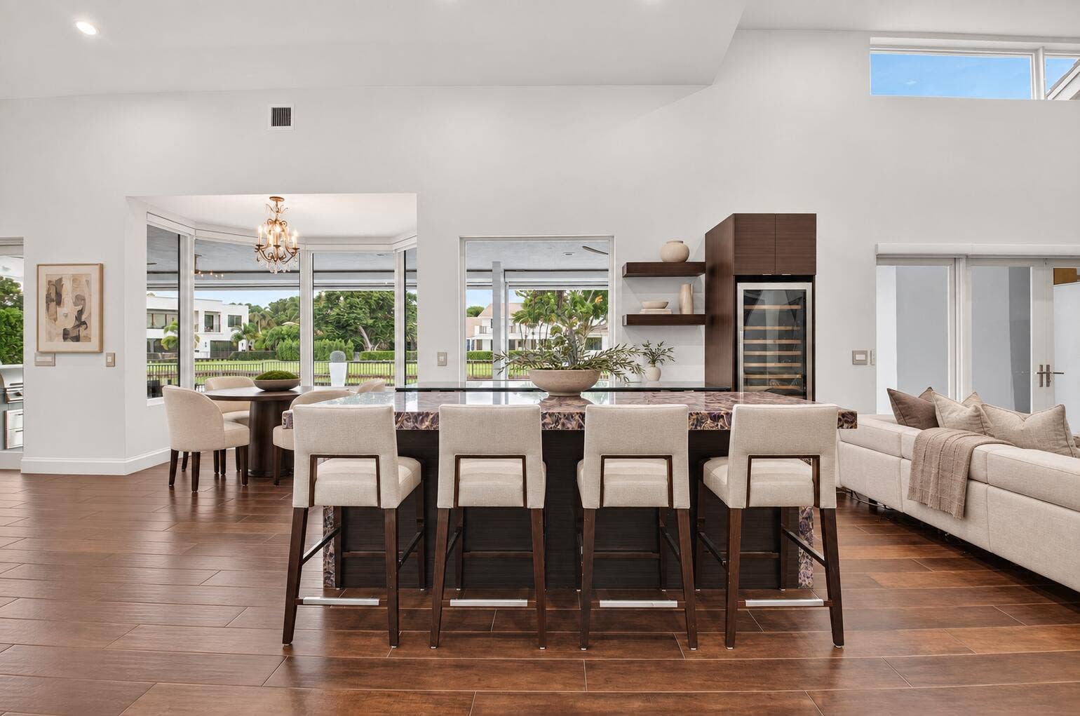 5757 HARRINGTON Way, Boca Raton, FL 33496 Warm luxury kitchen with ivory stools-5