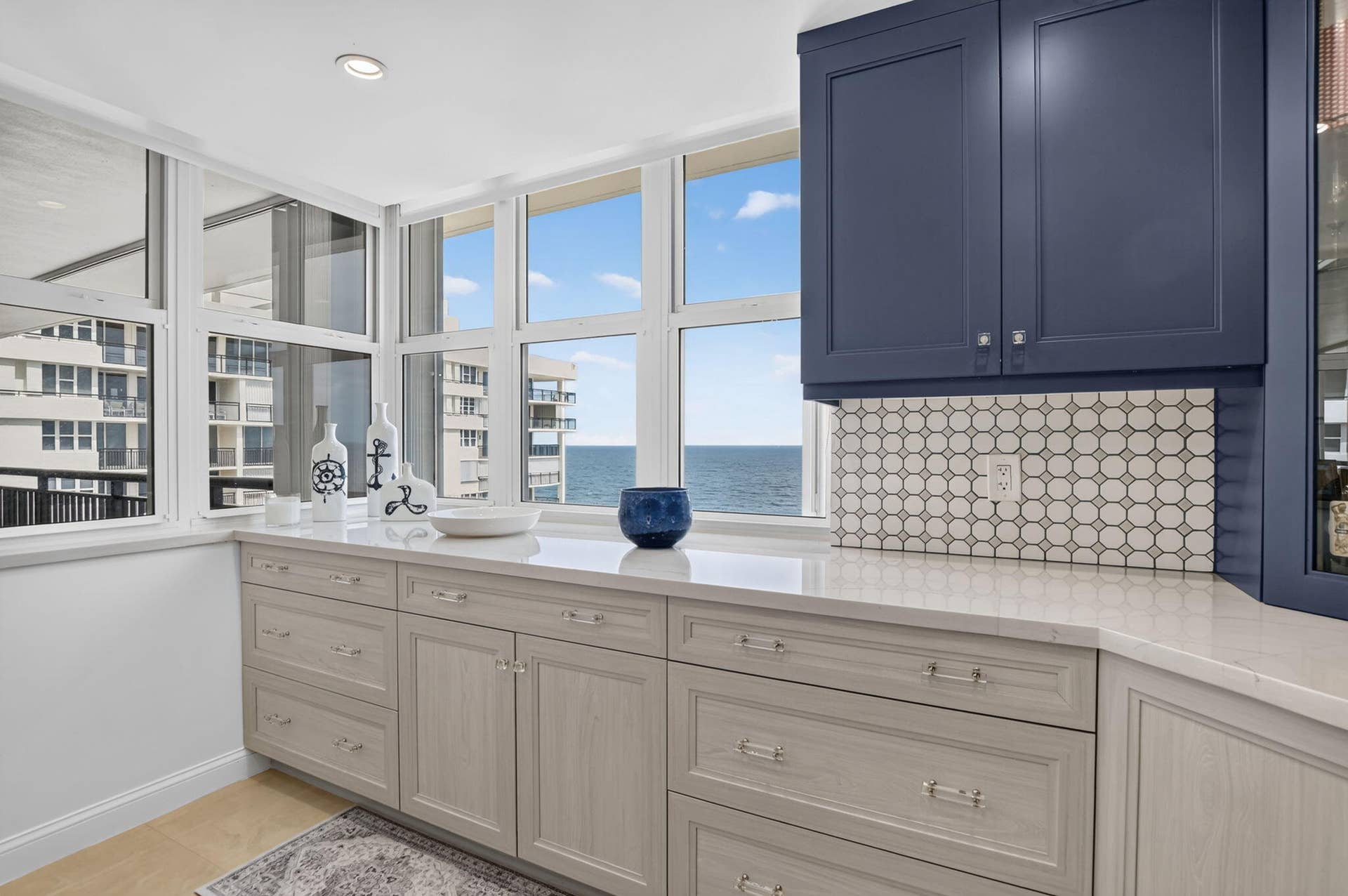 Gorgeous backsplash and countertops complete the look