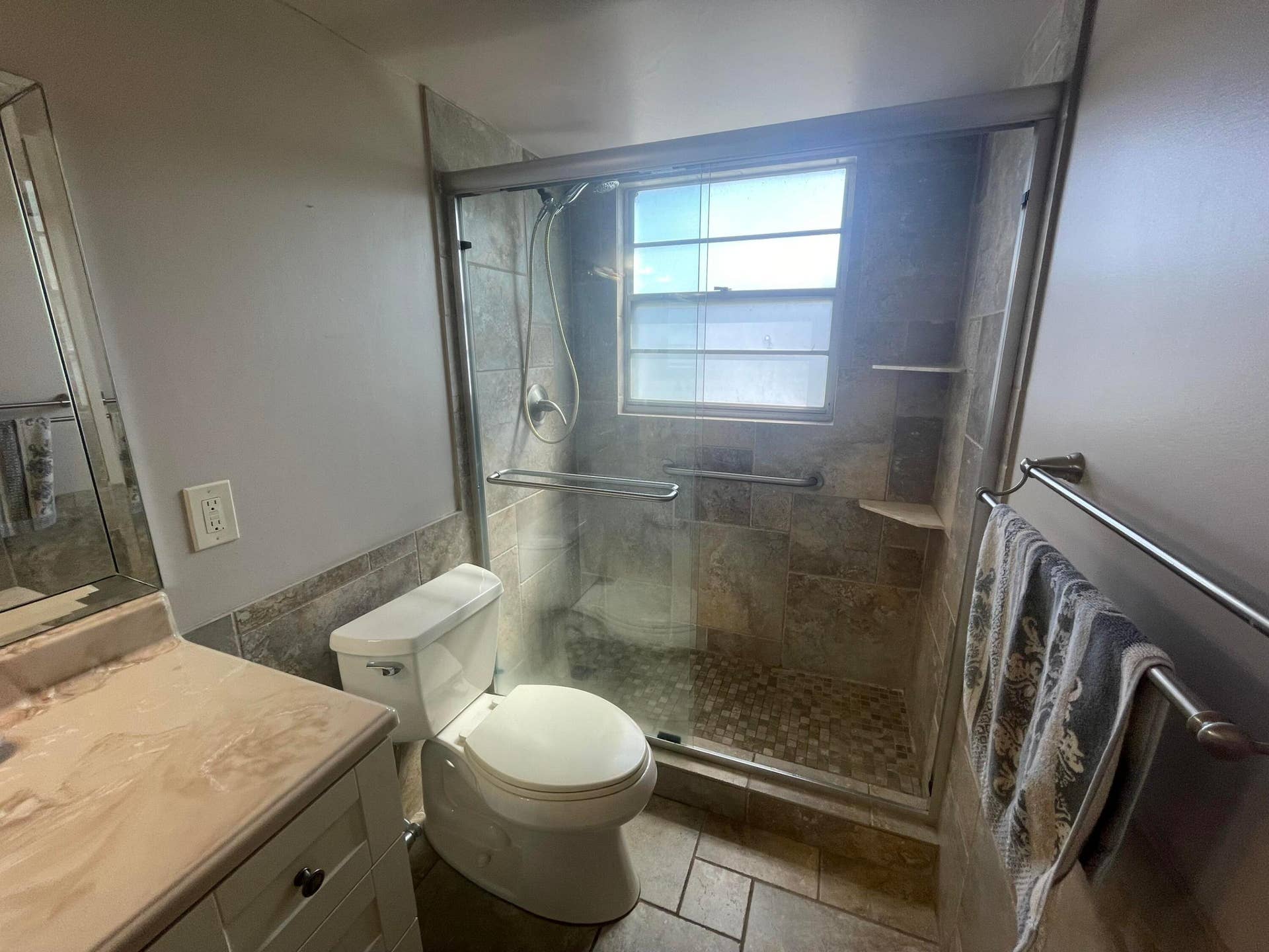 Renovated Second Bathroom with Glass Shower Doors