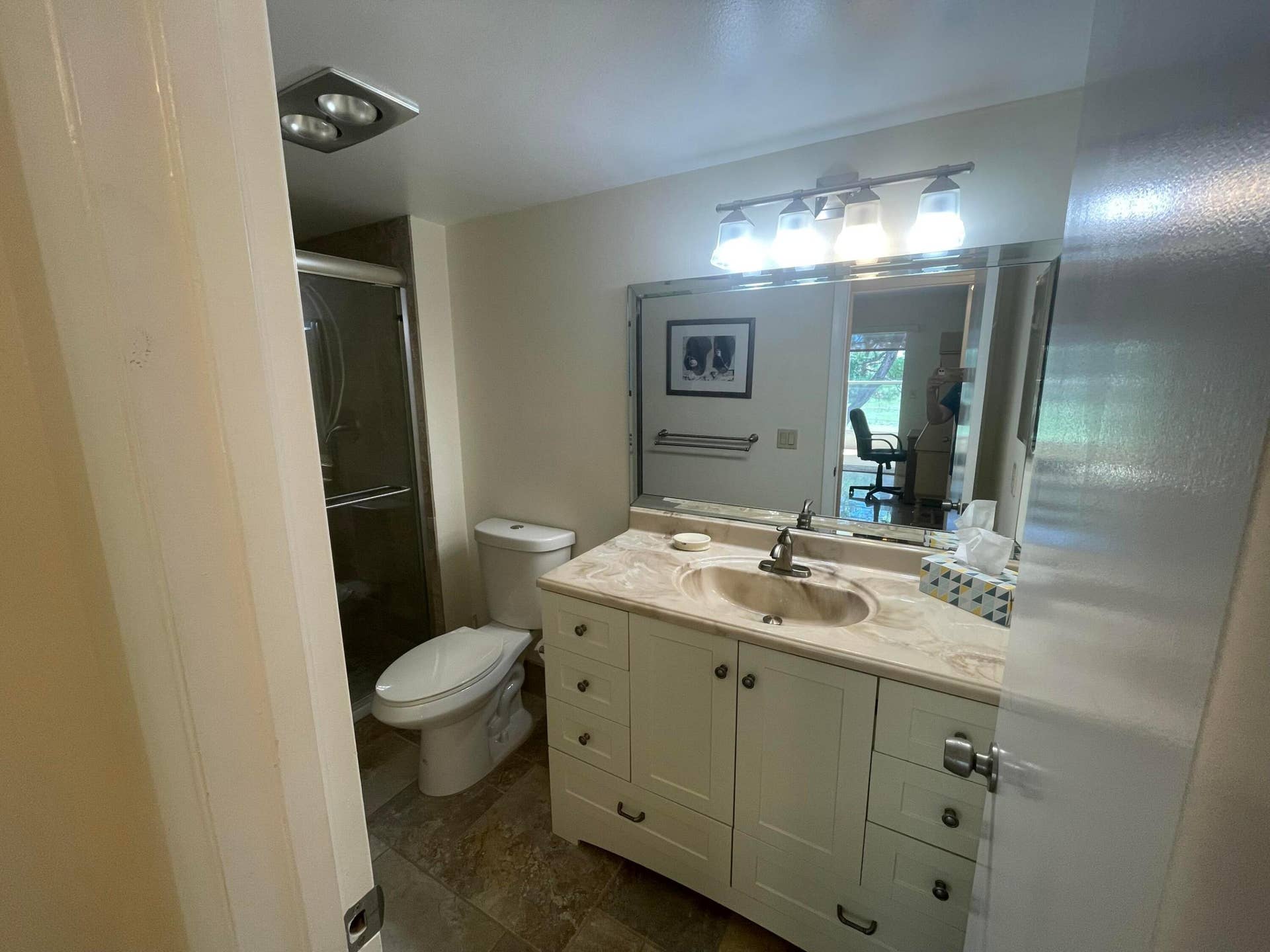 Renovated En-Suite Bathroom with Glass Shower Doors